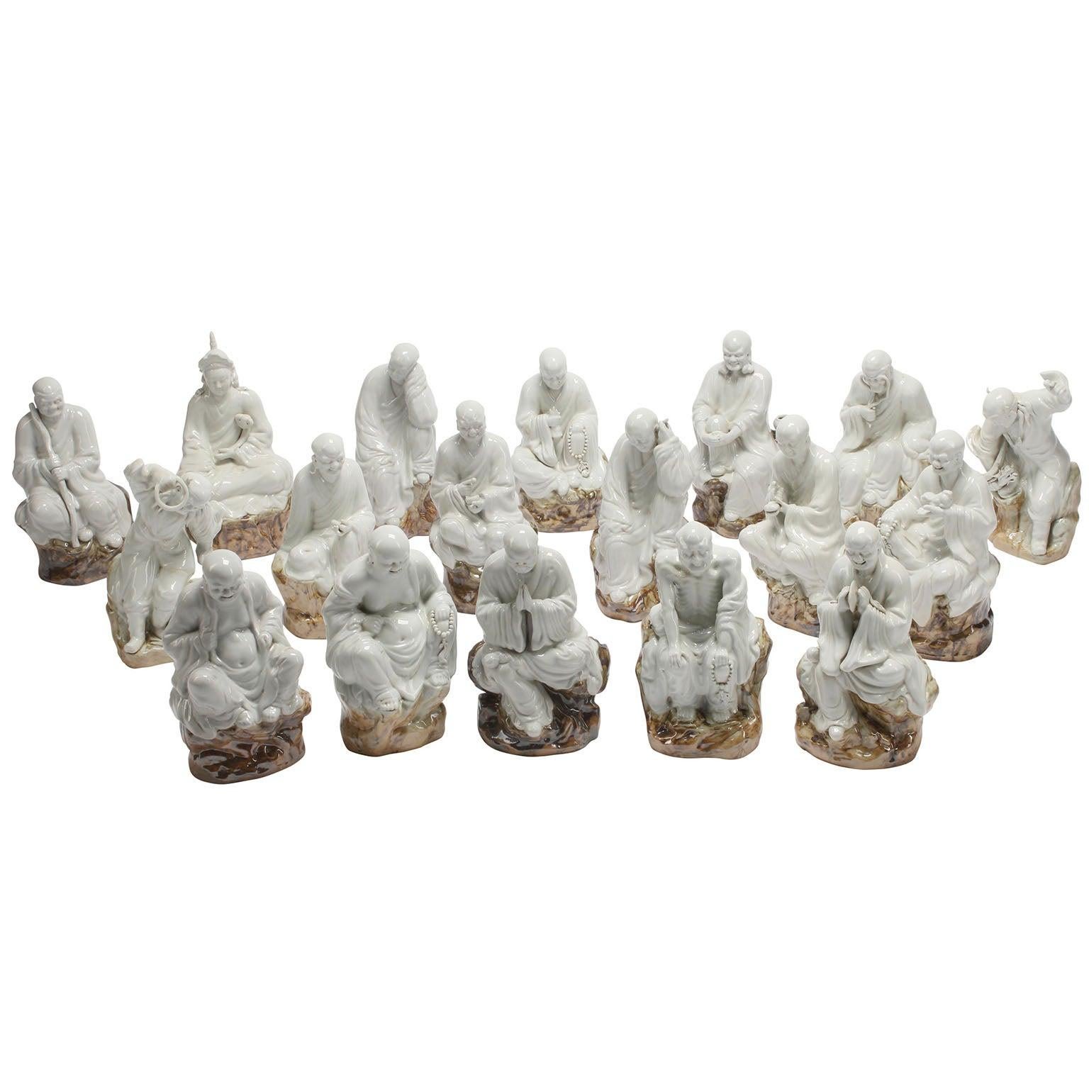 Chinese Set of Eighteen Blanc de Chine Enameled Ceramic Arhats or Luohan Buddhas