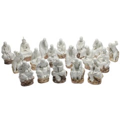 Vintage Chinese Set of Eighteen Blanc de Chine Enameled Ceramic Arhats or Luohan Buddhas