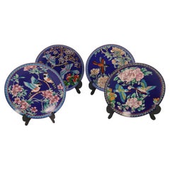 Vintage Chinese set of four cloisonne plates depicting birds and blossom, circa 1930
