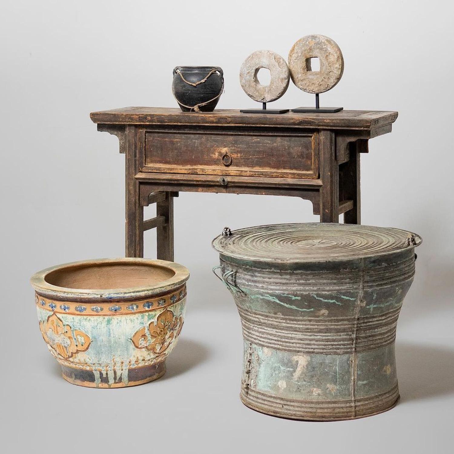 This offering table from China's Shanxi province dates to the early 19th century and was originally used to display an ancestor shrine in a provincial household. Incense, candles, and fruits would have covered the narrow table as offerings to the