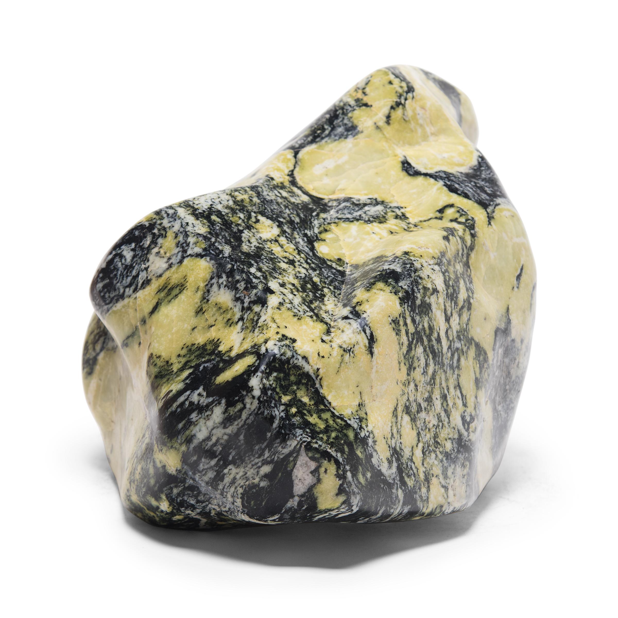 A well-chosen stone is a focal point of both a traditional Chinese garden and a scholar's studio - evoking the complexities of nature and inspiring creative thought. Sourced from China's Dongbei province, this meditation stone has a mesmerizing