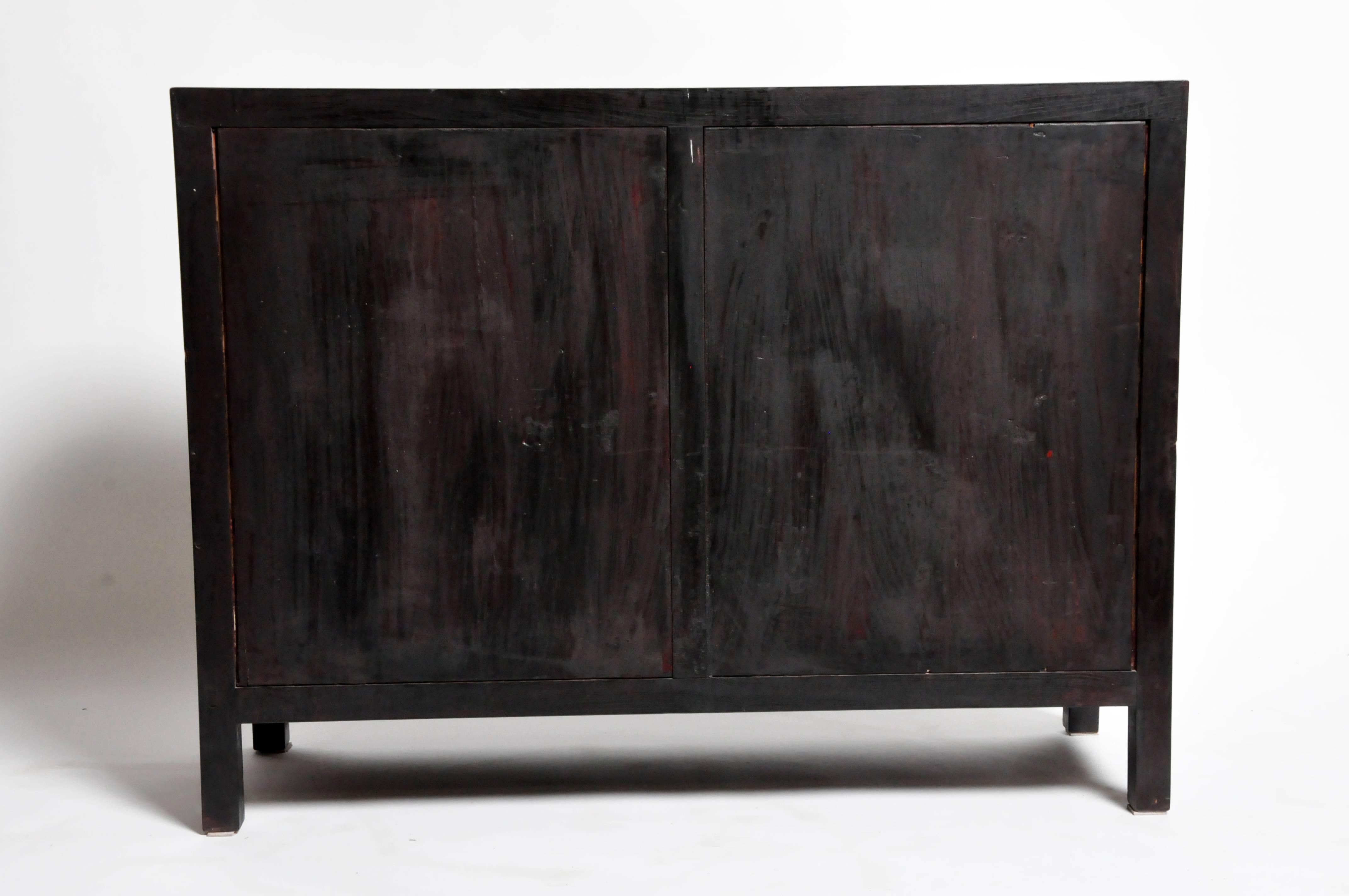 This sideboard is from Hebei, China and made from reclaimed yang wood. The piece features mortise and tenon joinery and interior a shelve for storage. You can also customize it and make your own. Wood, color, finish, and dimensions are all