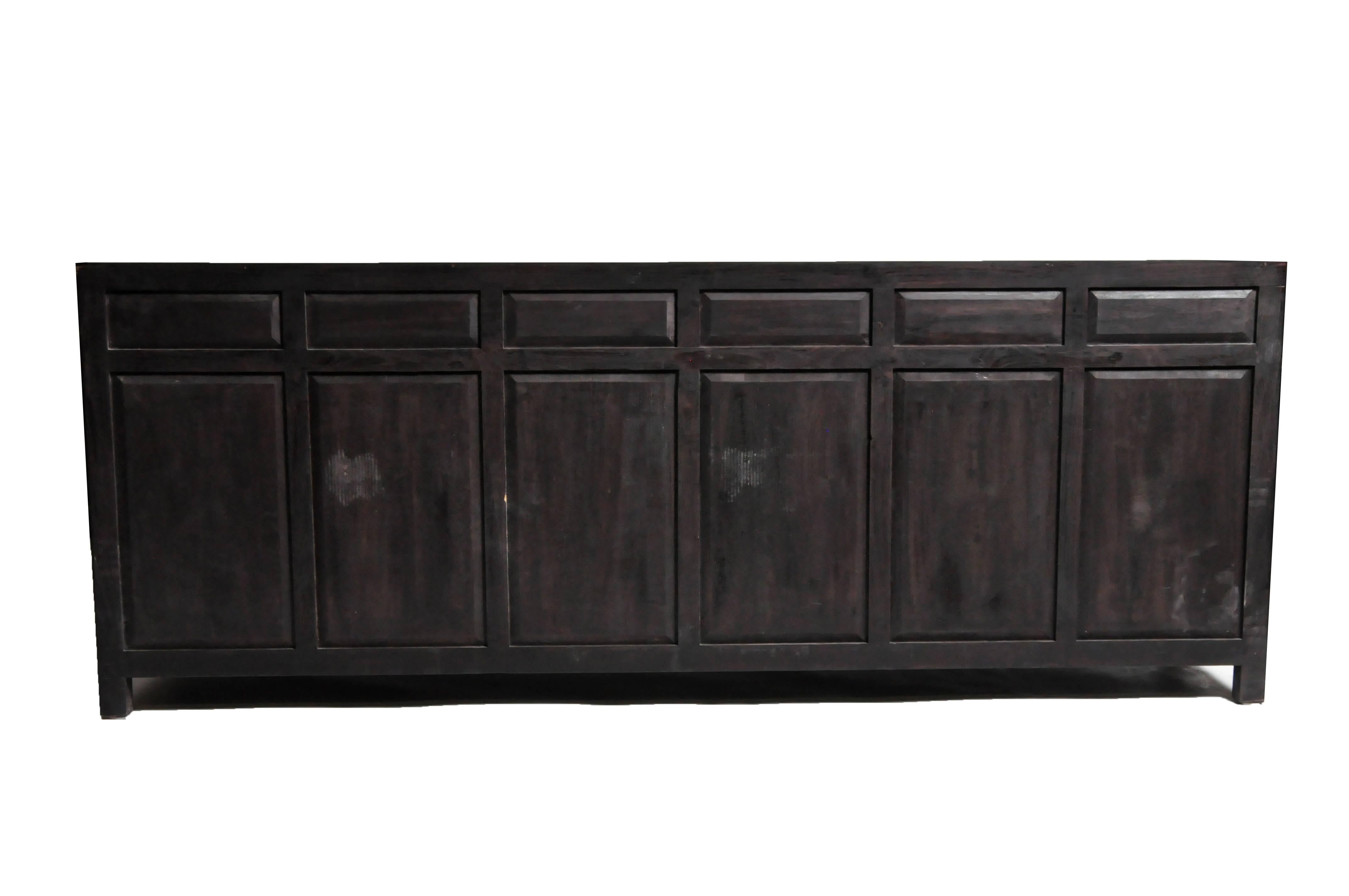 This sideboard is from Hebei, China and was made from reclaimed elm wood. The piece features mortise and tenon joinery, six drawers and three shelves below for ample storage. You can also customize a new one and make it your own. Wood, color,