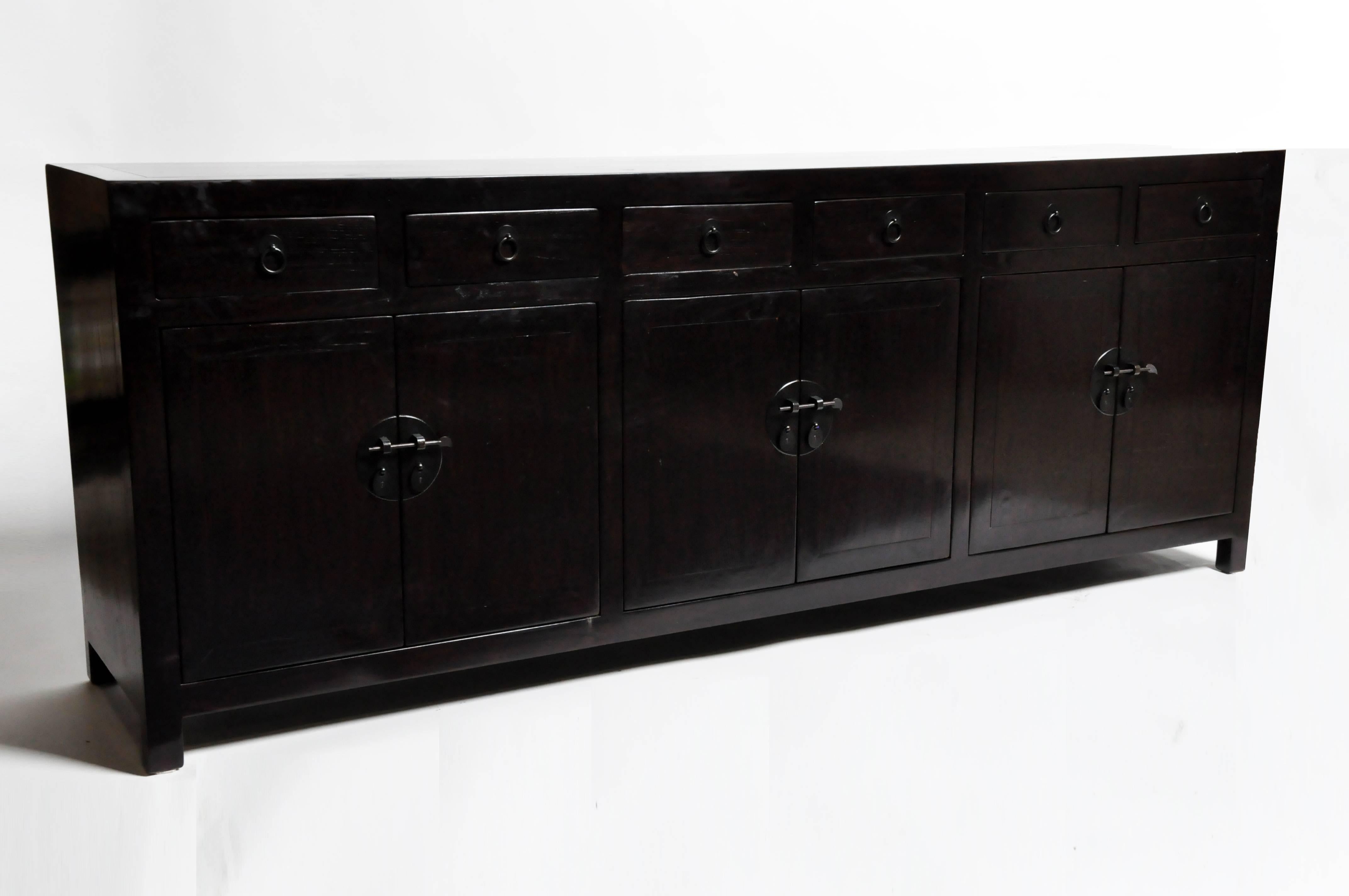 This sideboard is from Henan, China and was made from reclaimed elm wood. The features mortise and tenon joinery, six drawers, and three shelves below for ample storage. You can also customize a new one and make it your own. Wood, color, finish, and