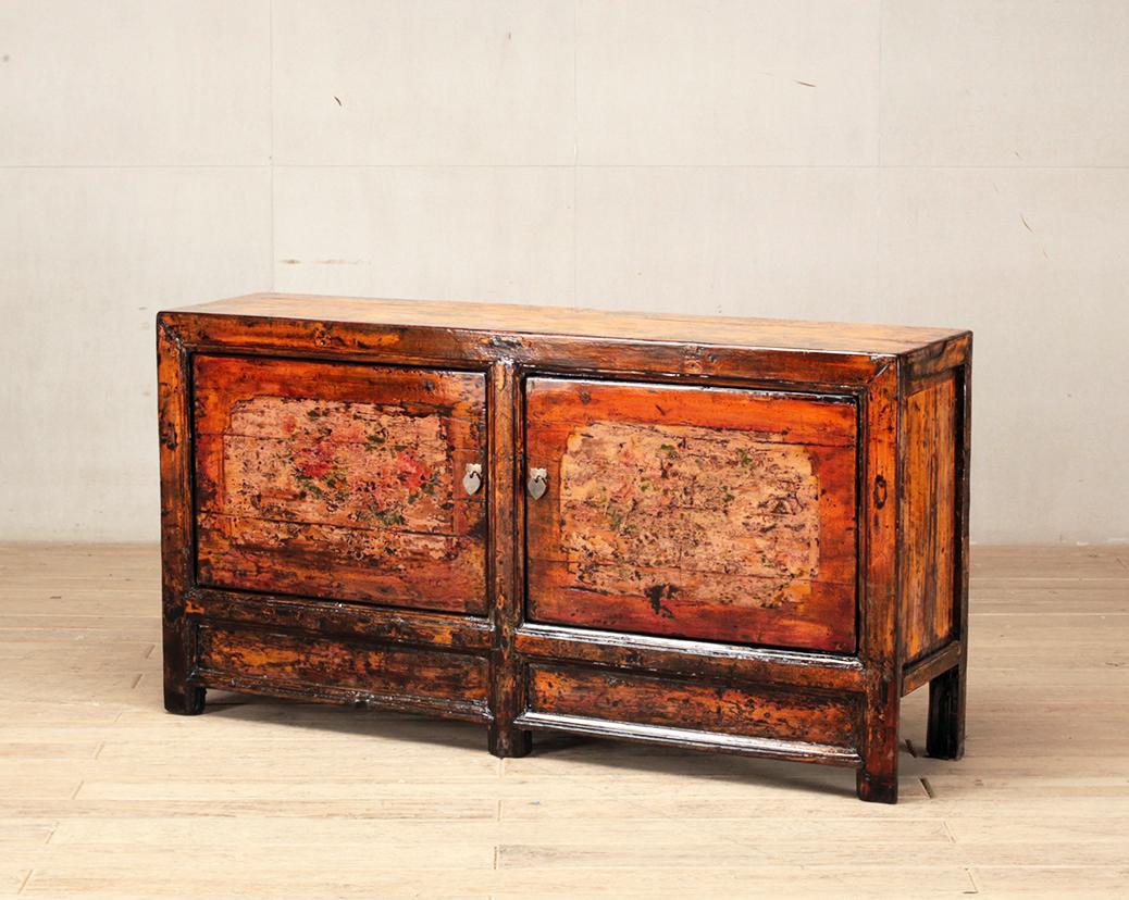This sideboard was made from reclaimed pine wood and paint with traditional nail-less joinery. The pine wood has been enhanced with a sophisticated French polish finish. The piece was restored in a workshop using reclaimed wood in China and features