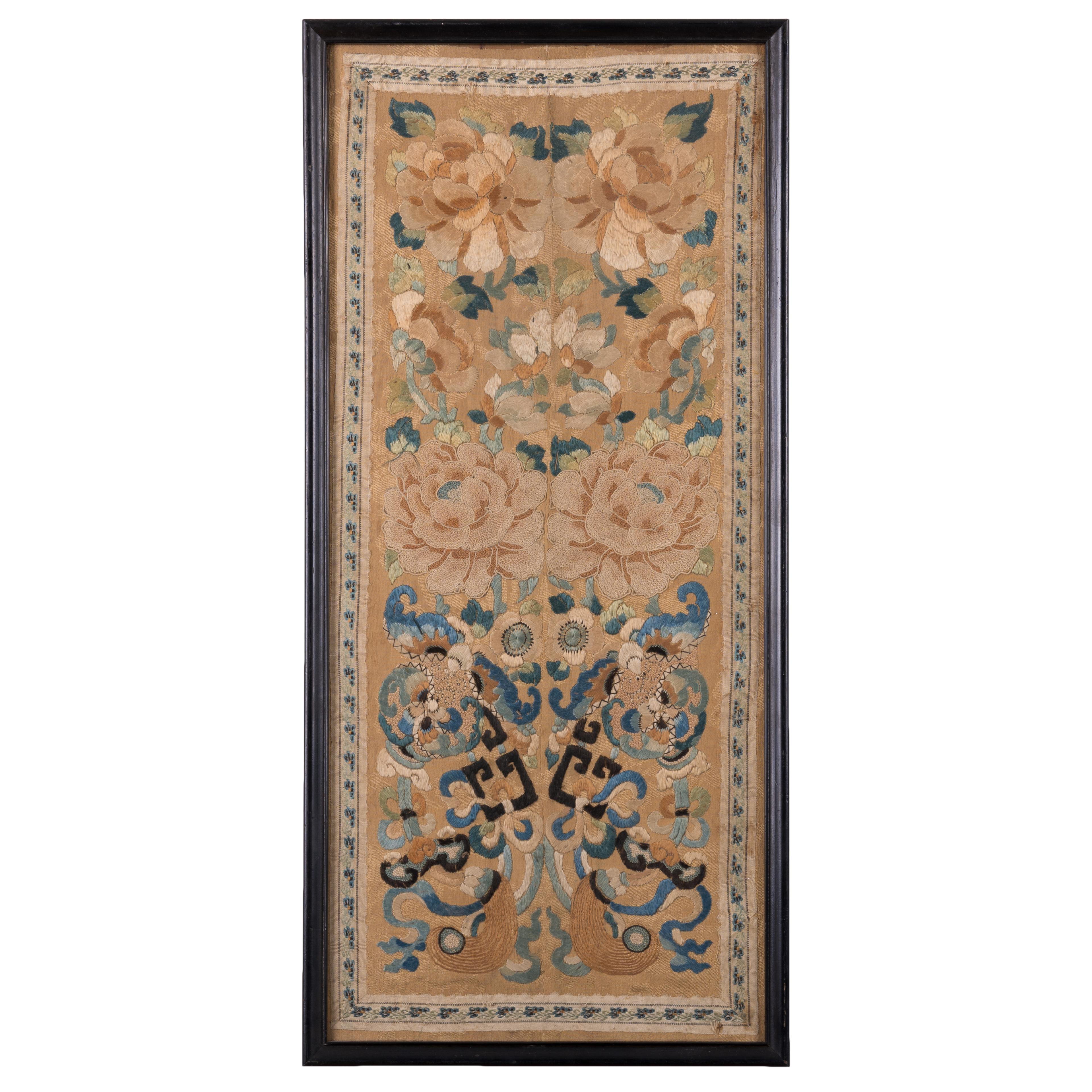 A Chinese Qing Dynasty silk embroidered mirrored panel, 19th century.

Sight: 9 by 21 inches
frame: 10 ¼ by 22 ¼ inches

