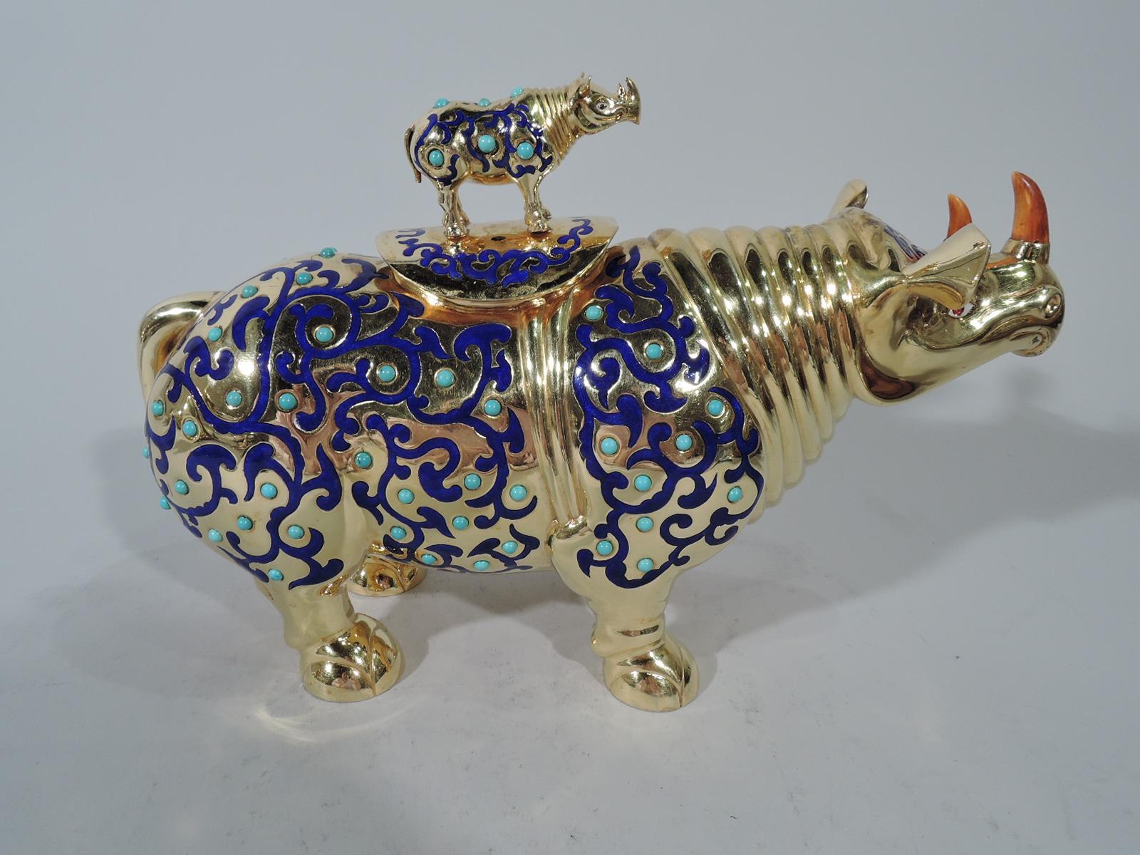 Chinese silver gilt and enamel box. Rhinoceros-form with flexed ears, concentric neck rings, short stumpy legs, and outsized hoofs. Rich yellow gilding embellished with cobalt enamel scrollwork and cabochon-cut turquoise beads. Oval dorsal cover