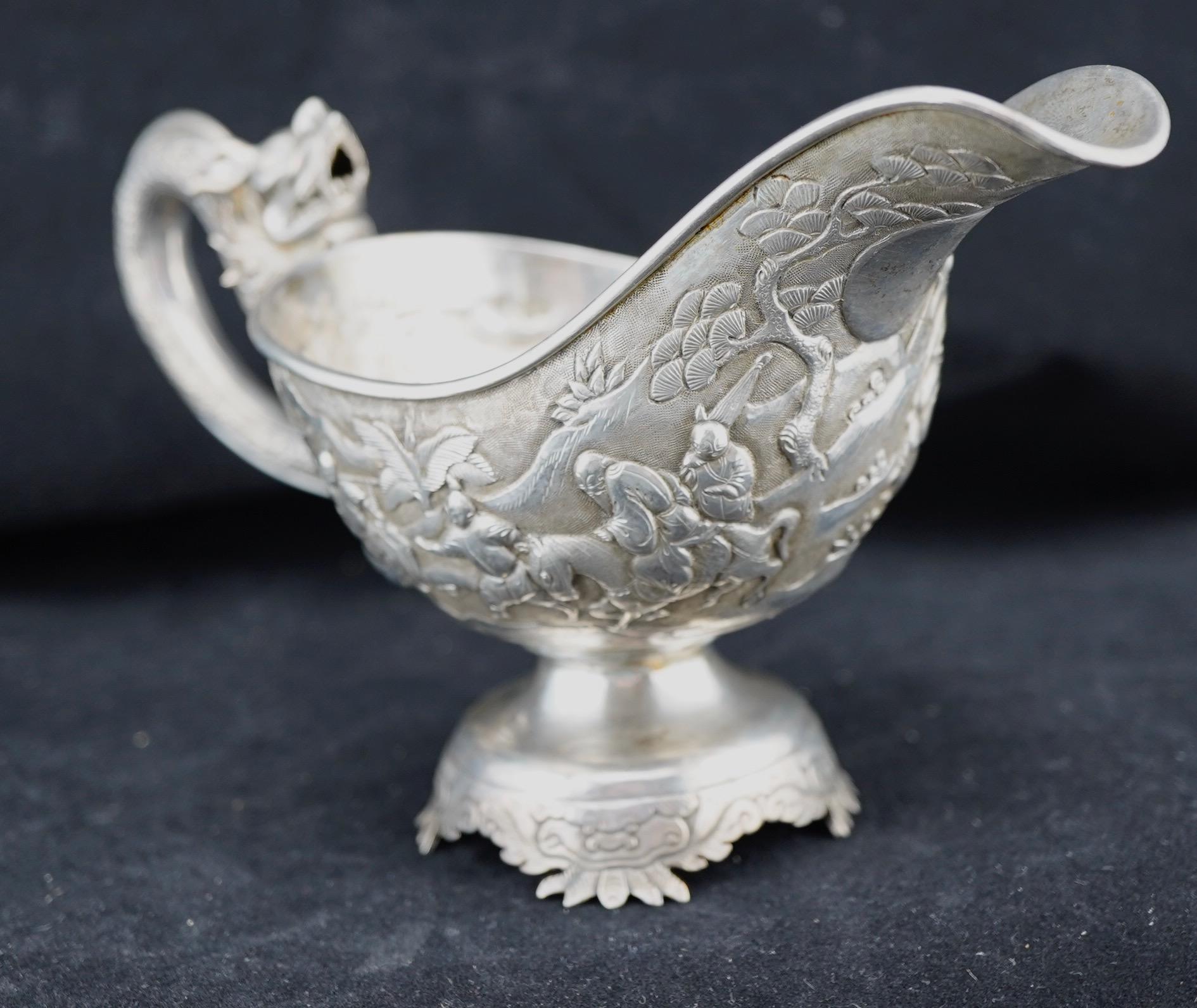 Cast Chinese Silver Repousse Dragon Handle Sauce Boat by Luen Wo For Sale