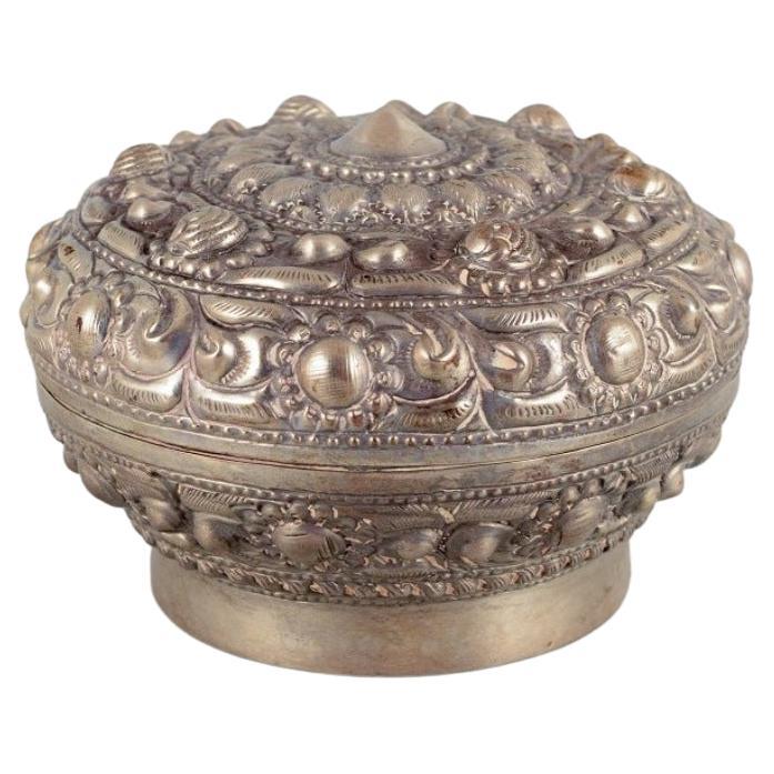 Chinese Silversmith, Lidded Jar / Box Richly Decorated in Relief, Approx. 1900 For Sale