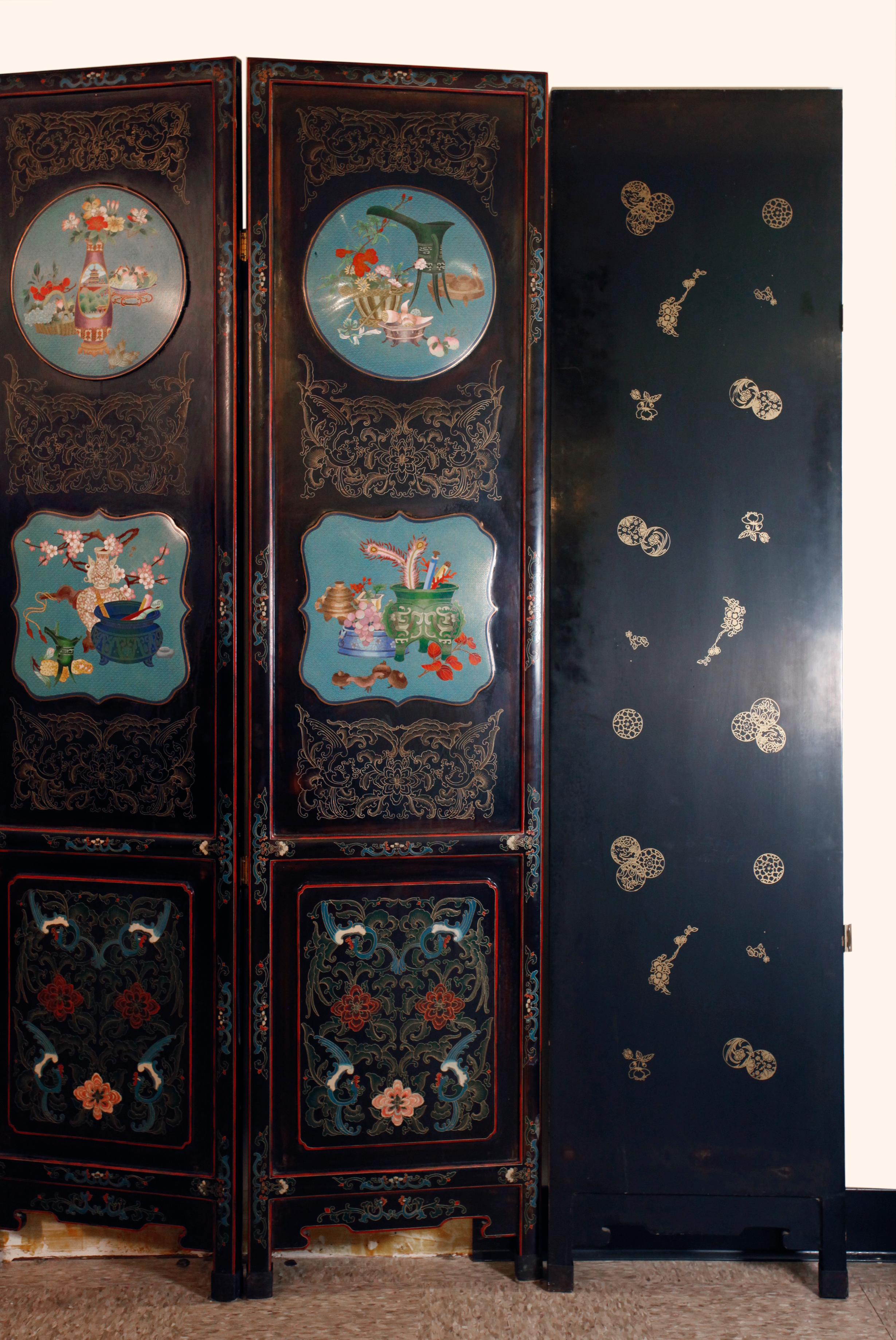measurements of each panel: 16in(L) x 65.5in(H) x 1in(D); each panel is adorned with cloisonné insets, which are surrounded by delicate, finely, painted incised decorations; back of each panel is painted with stylized gold flowers   