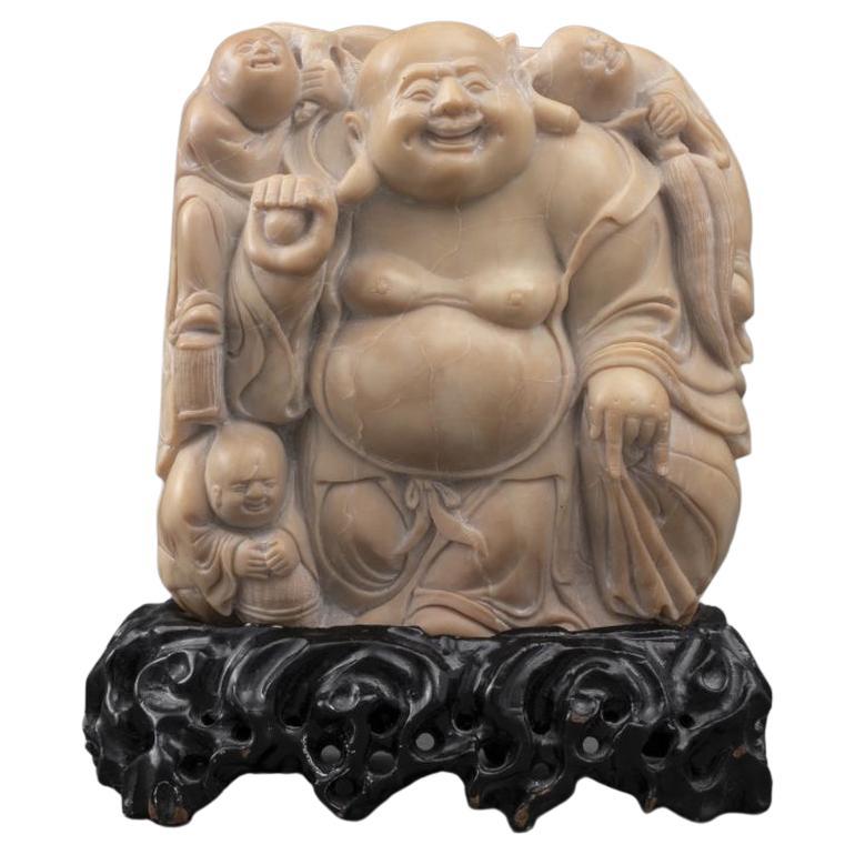 Talla china de Buda de esteatita sobre soporte