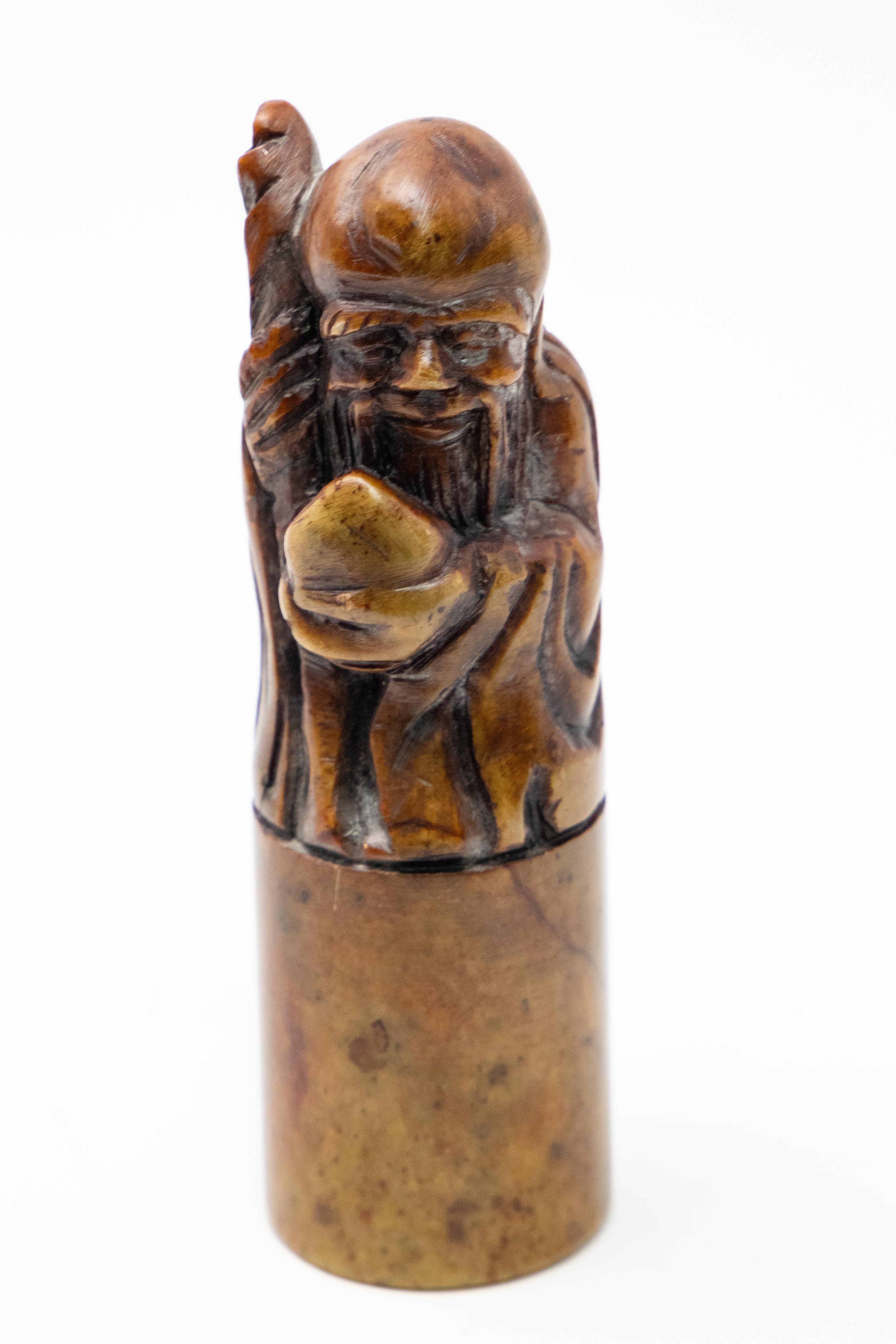 Offering this Chinese chop seal. On top it depicts Shoulao, god of longevity. He sits atop a cylindrical short base. He is blank all around and the bottom.

History of the Chinese chop seal. Chop seals have been a part of Chinese culture for