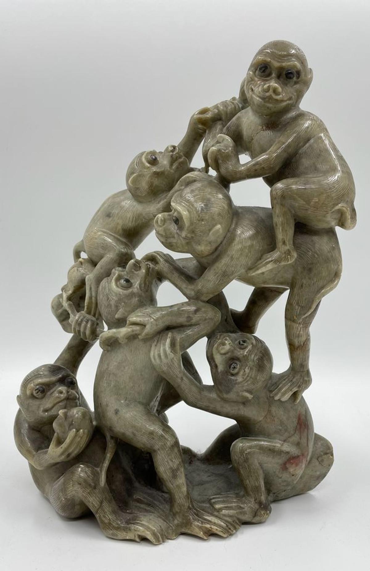  A rare museum quality large soapstone group , dating circa 1780 - 1800 .
Expertly carved from one piece of stone and beautifully detailed .
Seven Monkeys scrambling over one another for a peach , finely engraved fur with eyes painted black .
This
