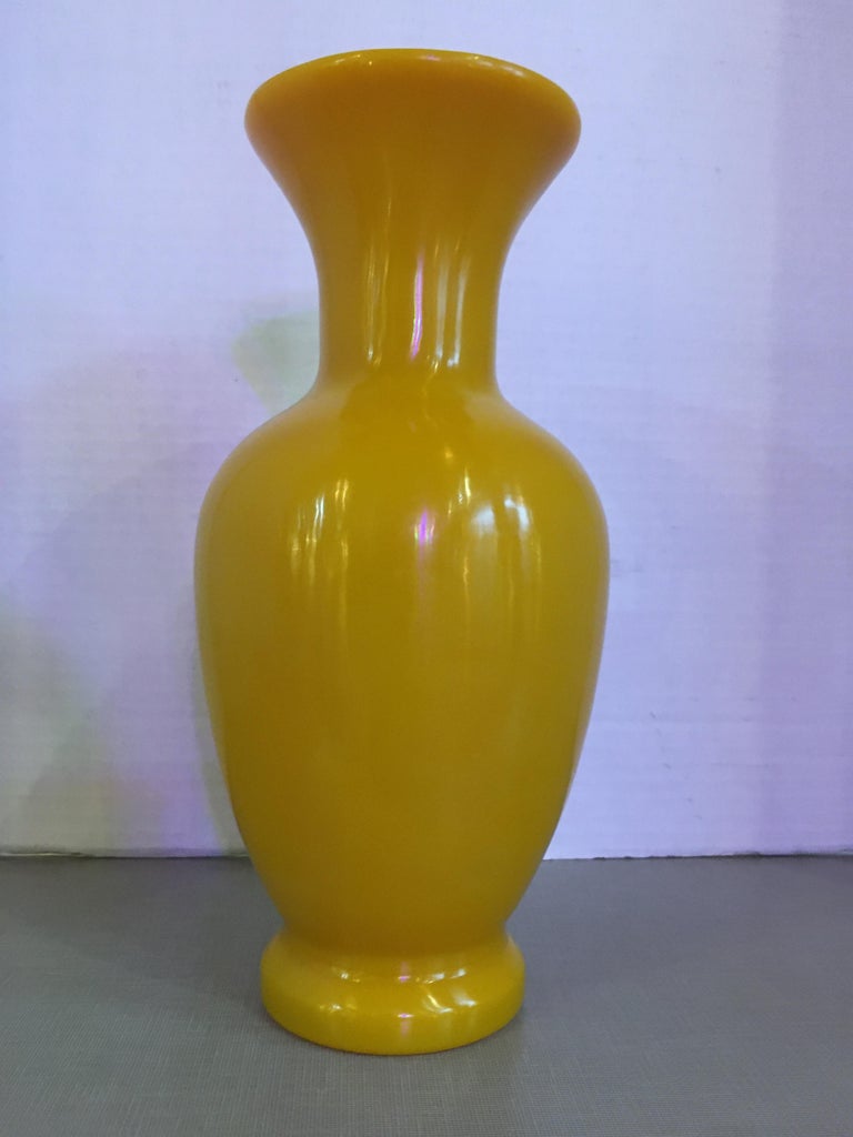 A Chinese solid yellow Peking glass vase.