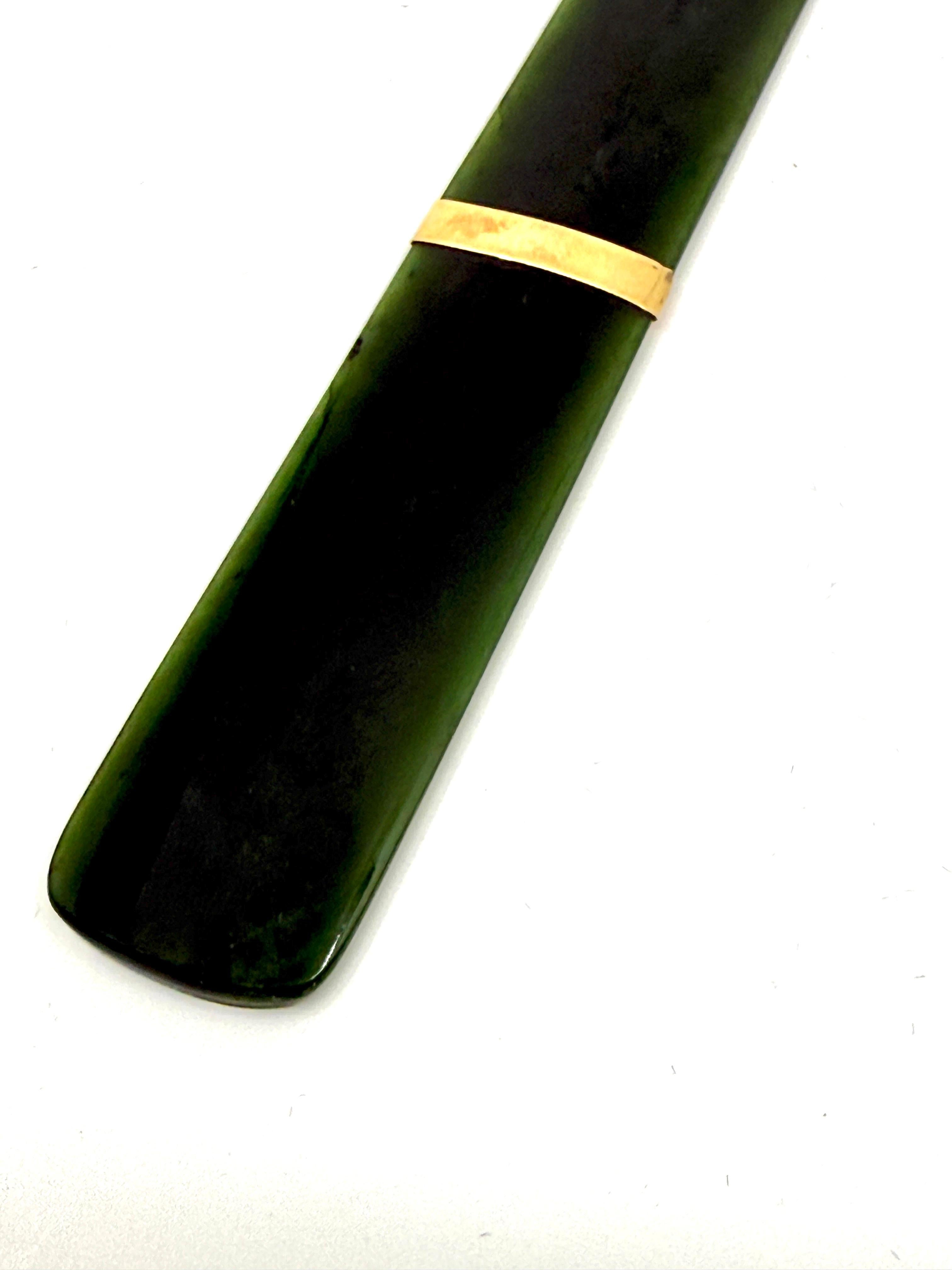 A pair of page turners we recently acquired out of an estate. the first is a Chinese Spinach Jade beauty with a band of gold. It is presumably gold filled as it’s not marked but may simply be a low karat band. The spinach jade is beautiful. The