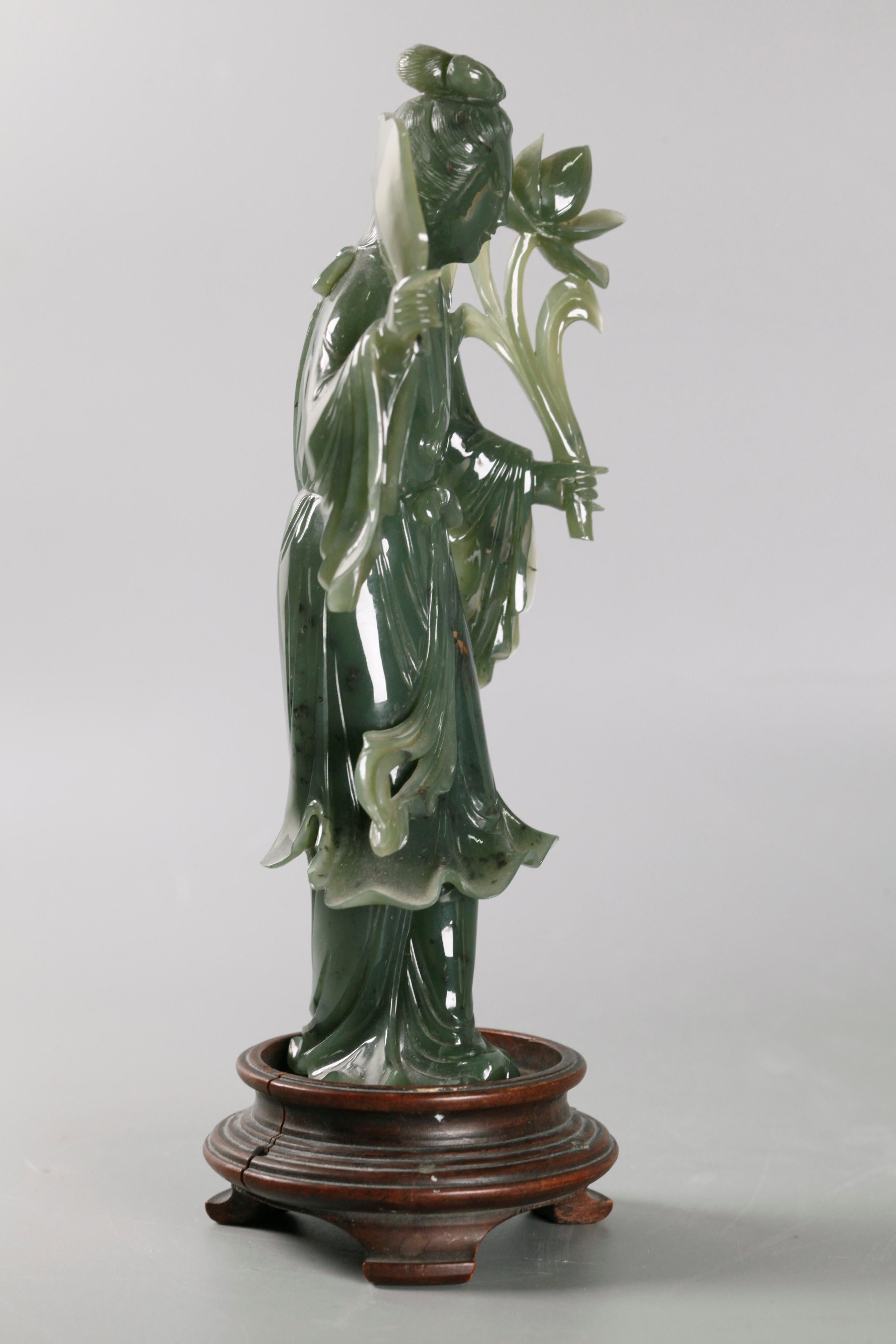 wooden base shown in pictures is not included with this item; 2.5in(D) x 3.5in(W) x 8in(H) are the dimensions of the jade carving only