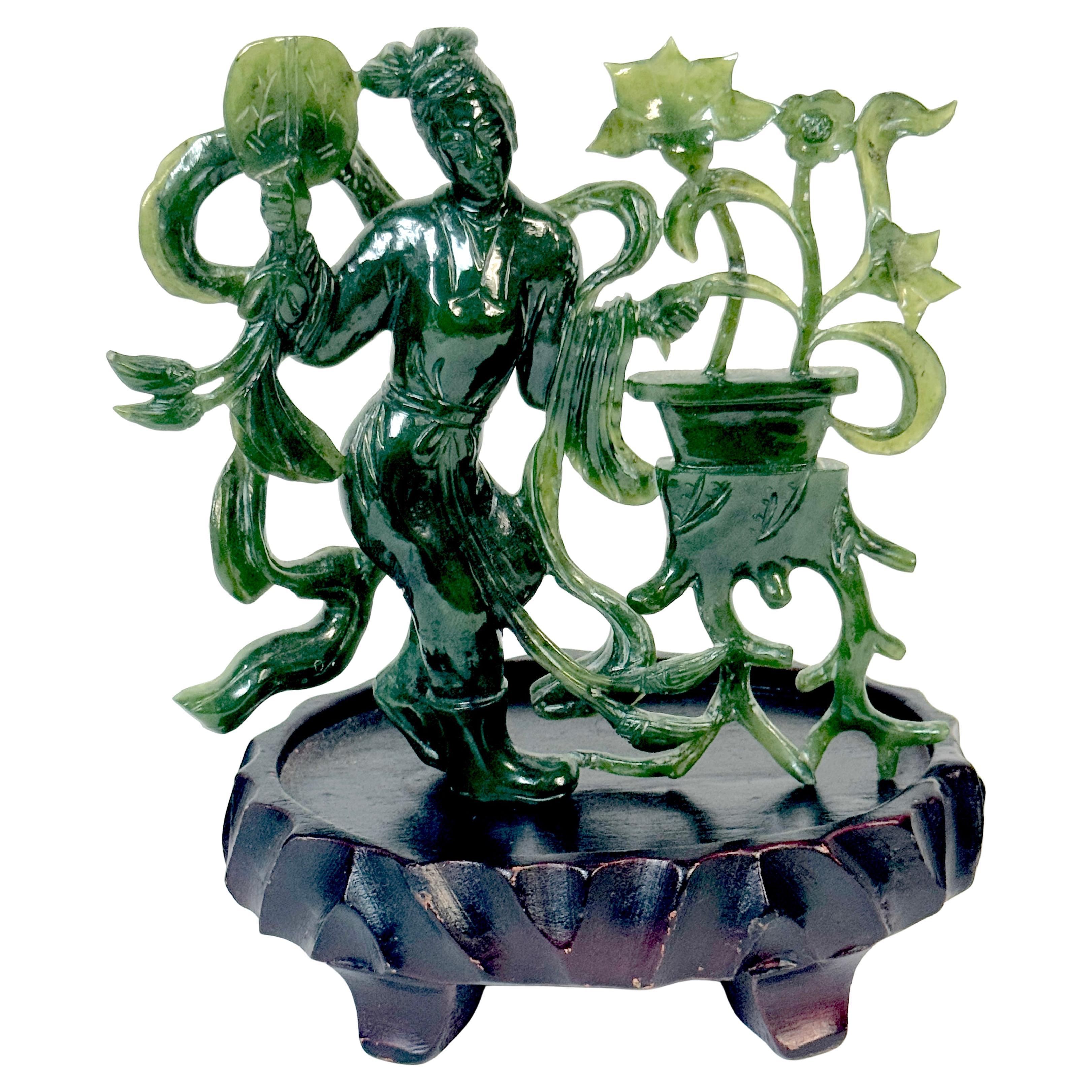 Chinese Spinach Nephrite Jade Immortal with Lotus, Mid-20th Century For Sale