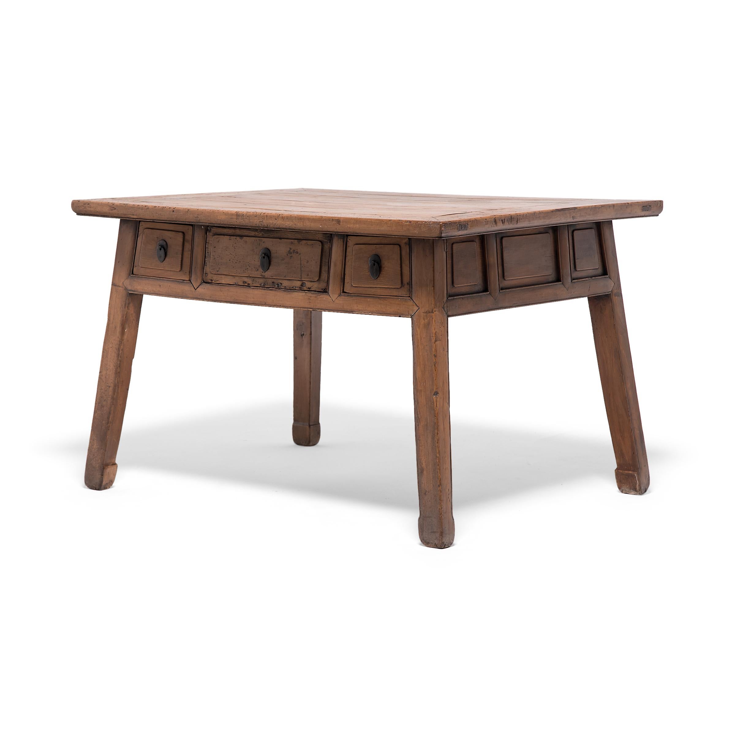 Though crafted in the mid-19th century, this three drawer center table embodies the style of farmhouse modern with clean lines and the natural warmth of cypress timbers. Constructed with mortise-and-tenon joinery, the rustic table has an expansive