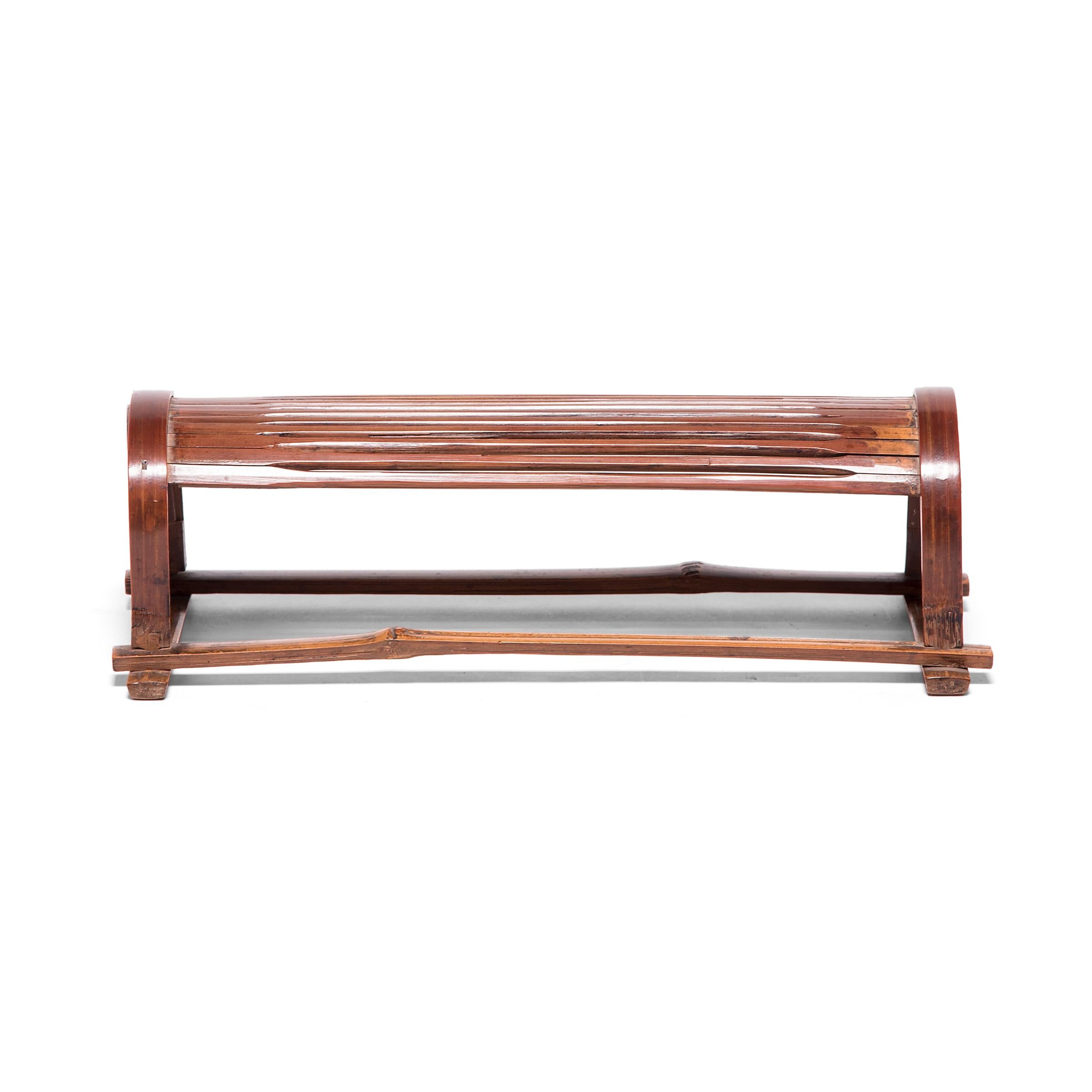 Crafted from lengths of split bamboo, this headrest enabled contour comfort, quite luxurious for 19th century, China. Lightweight and low-profile, it was the perfect accessory for a high class young woman to travel in comfort. It is an unexpected