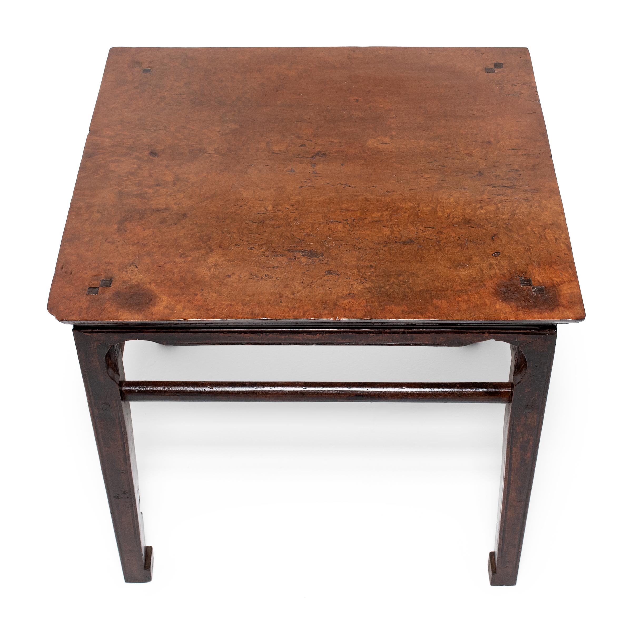 This square center table dates to the mid-19th century and wonderfully exemplifies Qing-dynasty furniture design. Found at the center of social activity, Chinese square tables such as this were used on a daily basis for eating meals, serving tea, or