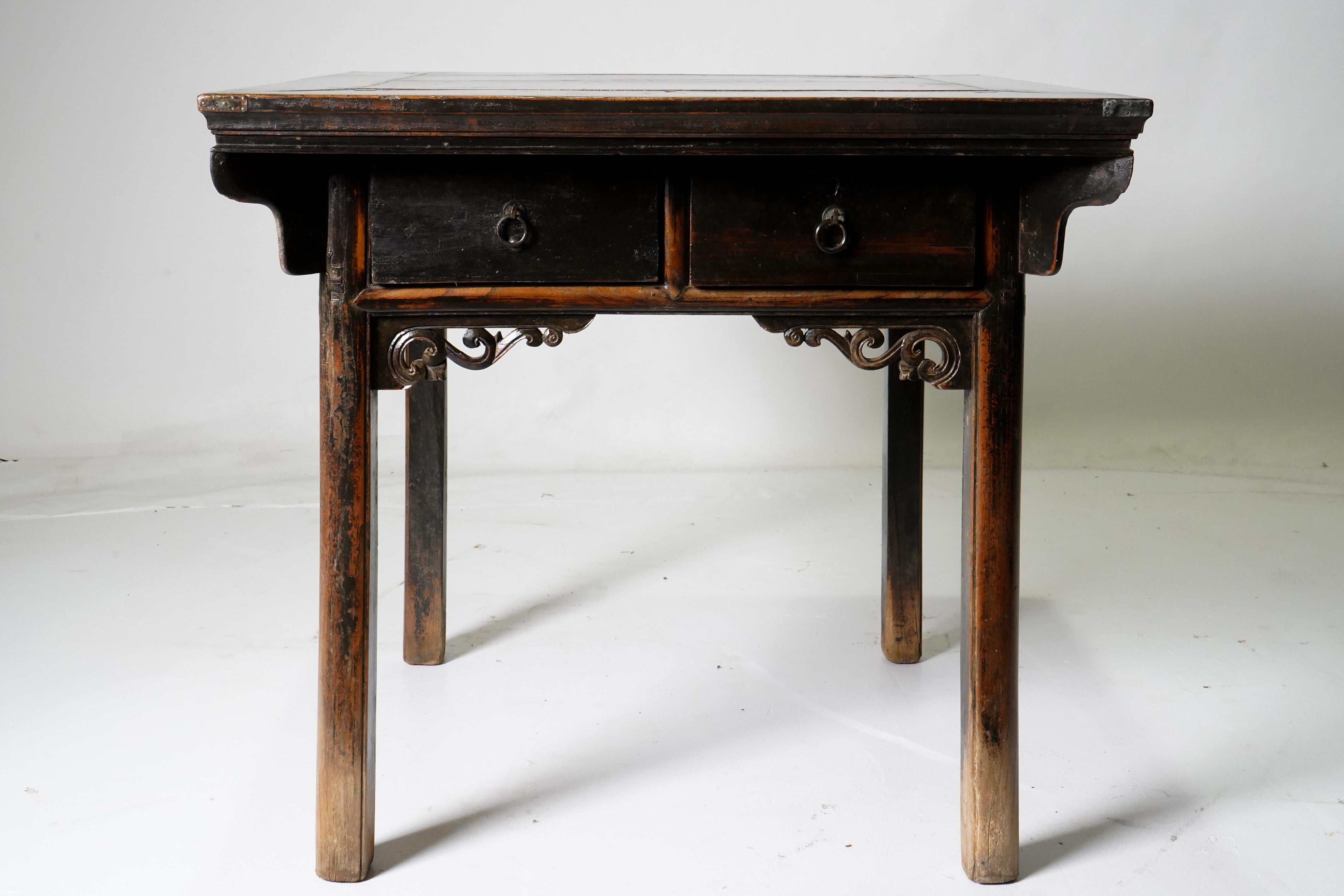 This sturdy, almost architectural Chinese table is is an excellent example of 