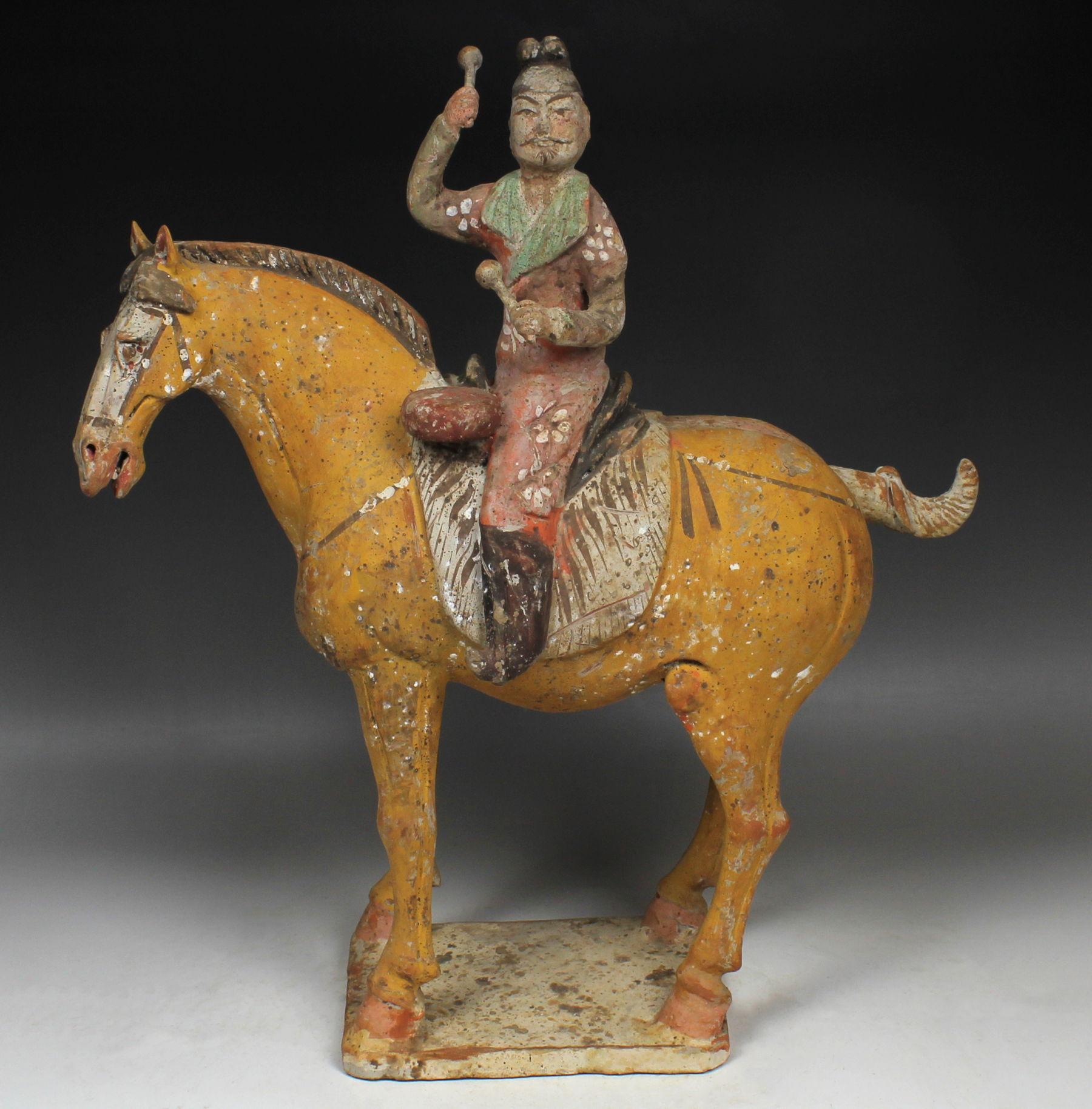 ITEM: Statuette of a horse with musician
MATERIAL: Pottery
CULTURE: Chinese, Tang Dynasty
PERIOD: 618 – 907 A.D
DIMENSIONS: 420 mm x 365 mm x 145 mm
CONDITION: Good condition. Includes Thermoluminescence test by Oxford Authentication (Sample