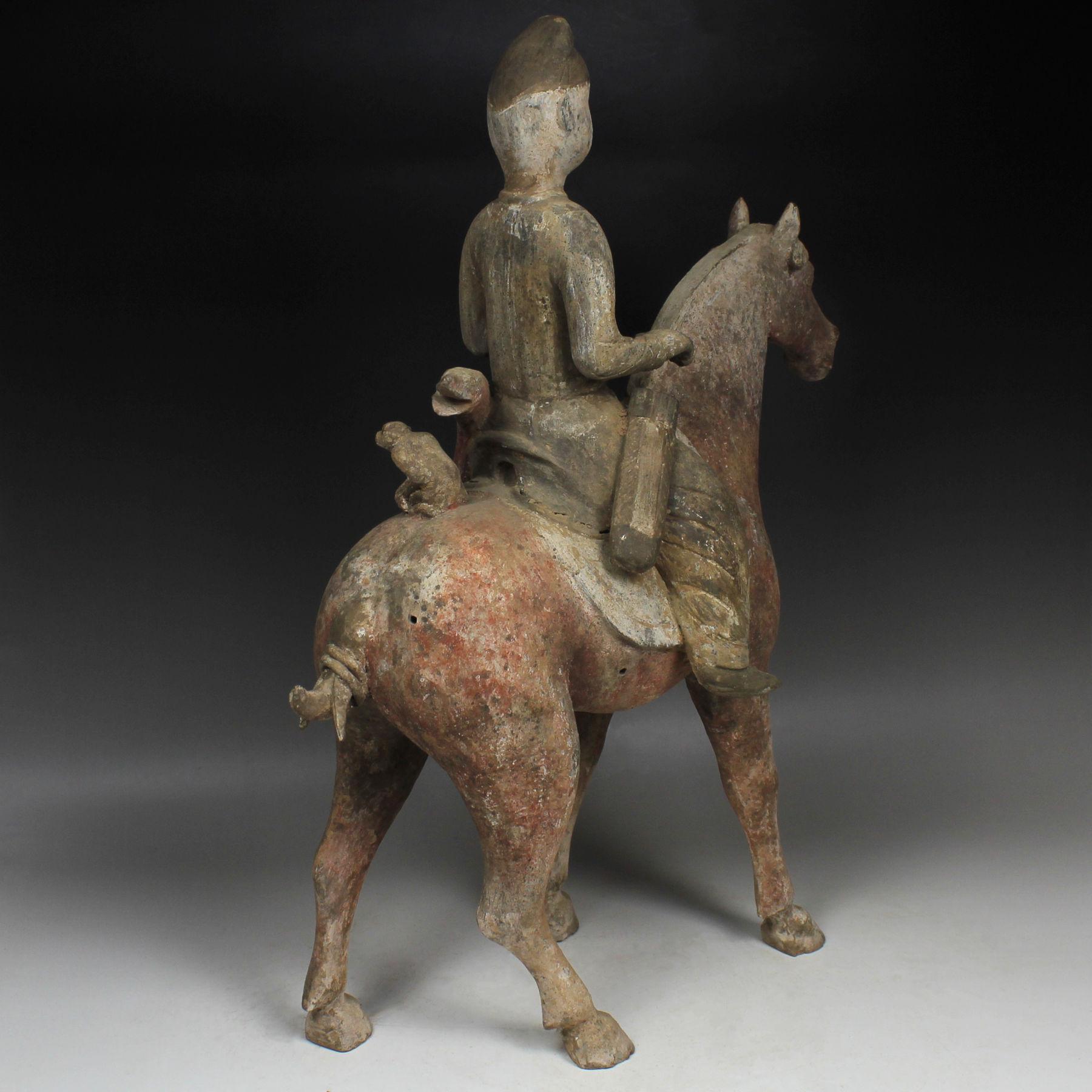 Chinese statuette of a horse with rider For Sale 1