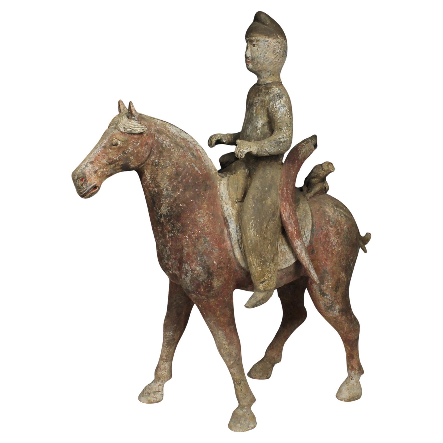 Chinese statuette of a horse with rider For Sale