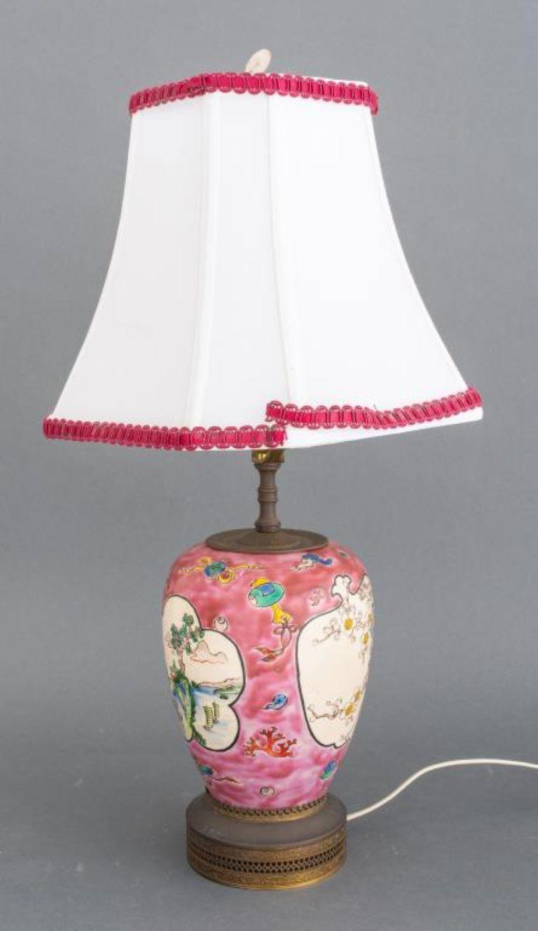Chinese style ceramic lamp, mauve glazed, with fan and flower shaped frames containing genre and landscape scenes. 