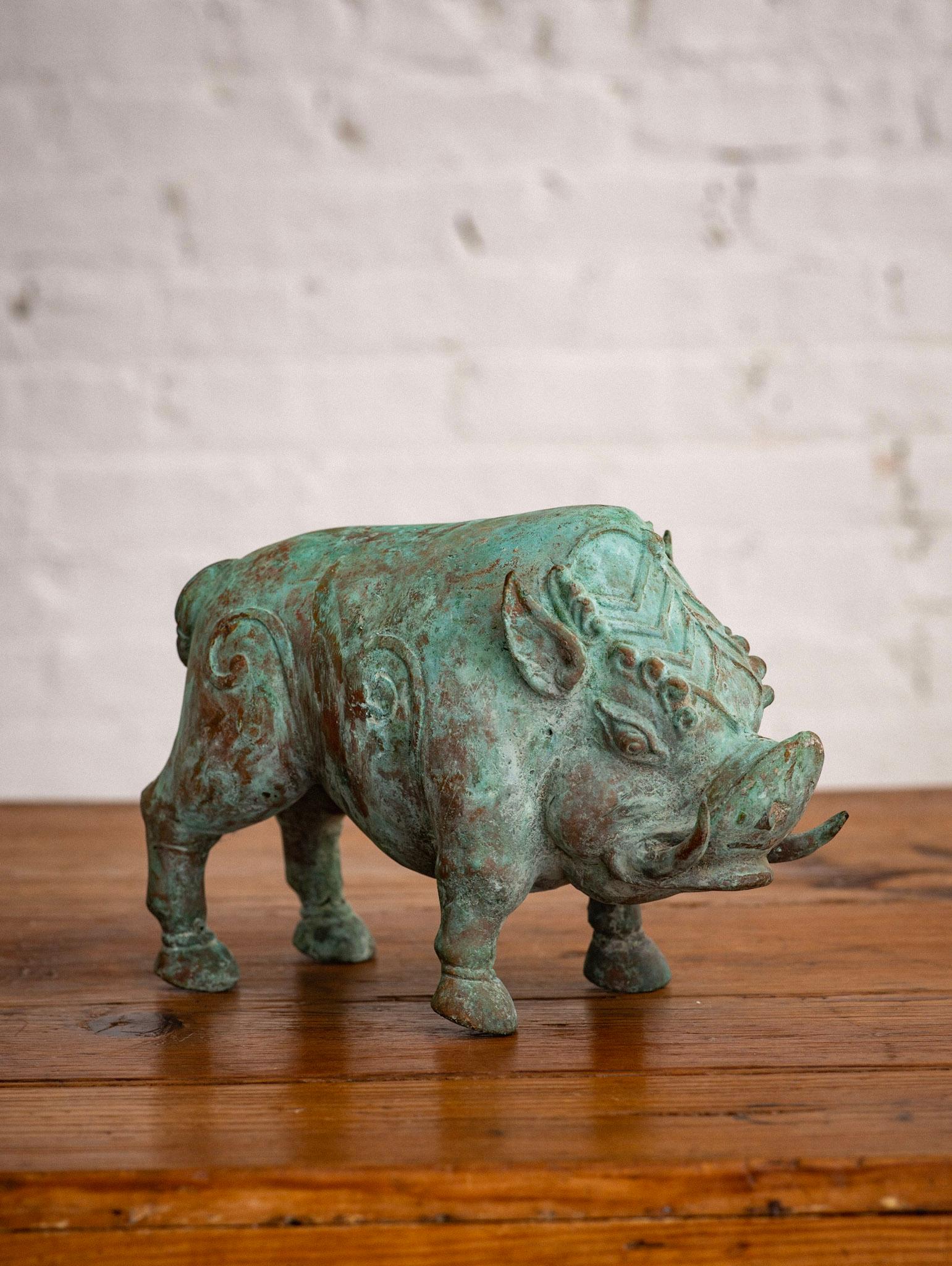 Figurative decorated boar objet d’art. Made of verdigris copper. Attributed to being Chinese based on style and subject.