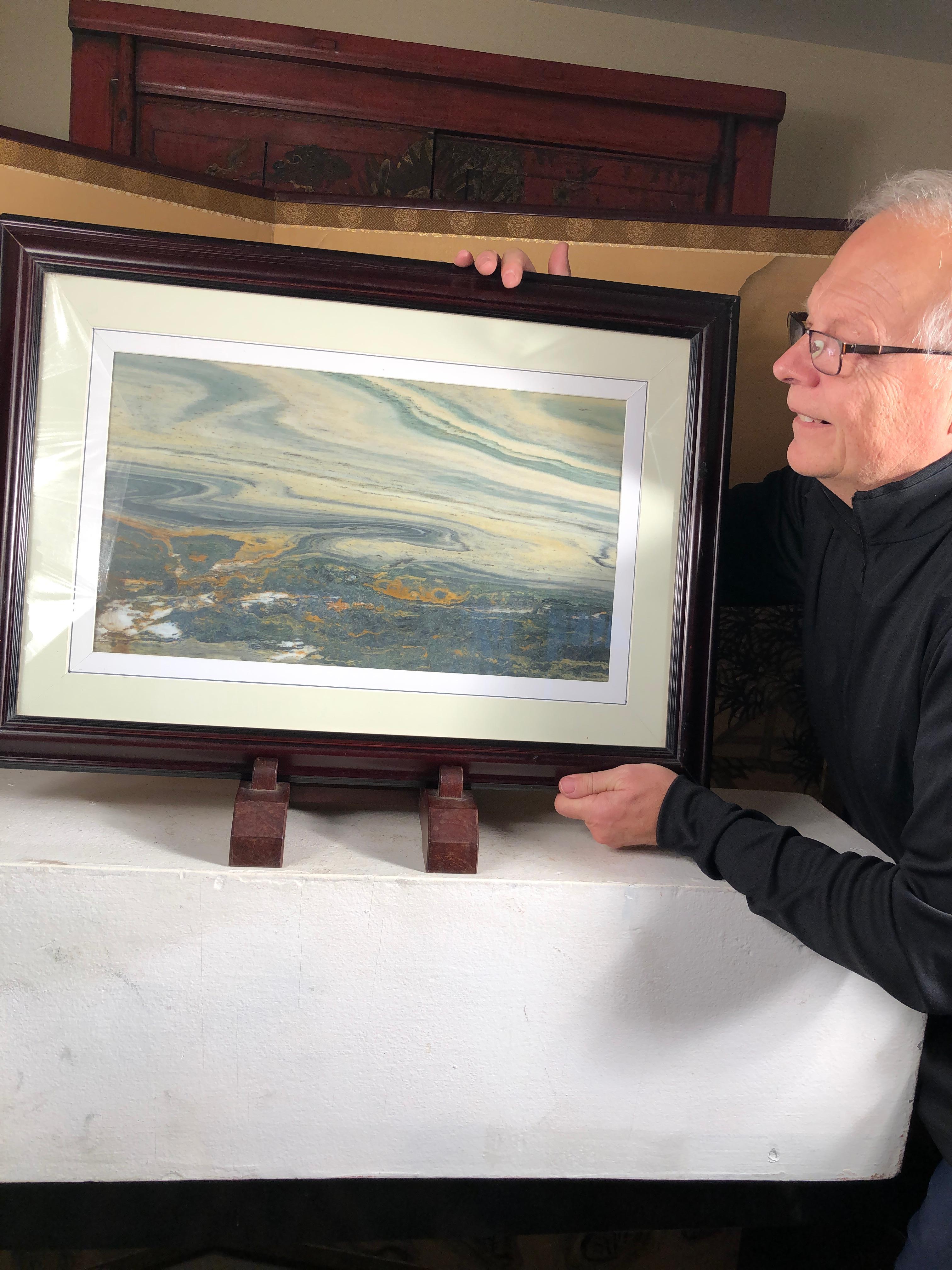Extraordinary natural work, one of a kind. Custom framed

This Chinese extraordinary round natural stone 
