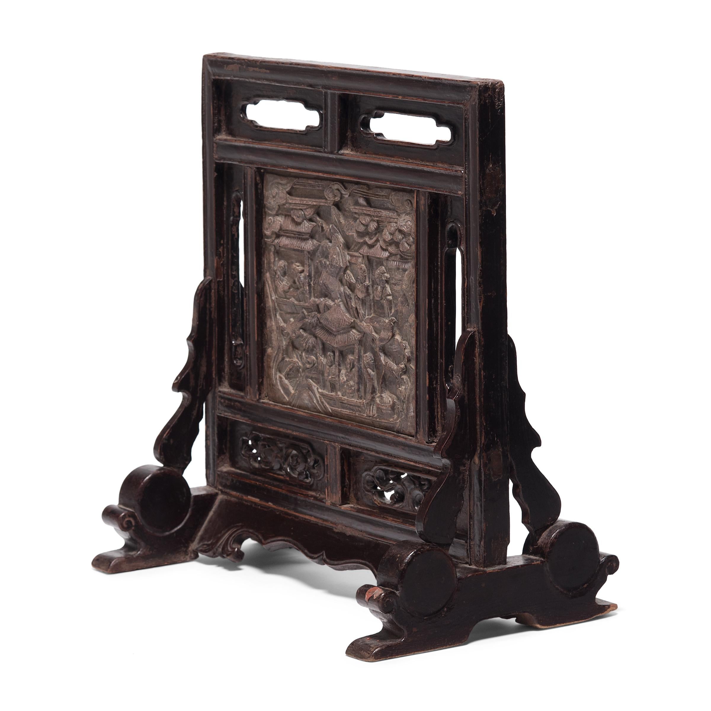 Prevalent in fine Chinese interiors as early as the Tang dynasty (618-906), standing screens with decorative stone panels served numerous functions as portable architecture. Used to section off a room or as a backdrop to a throne or floral