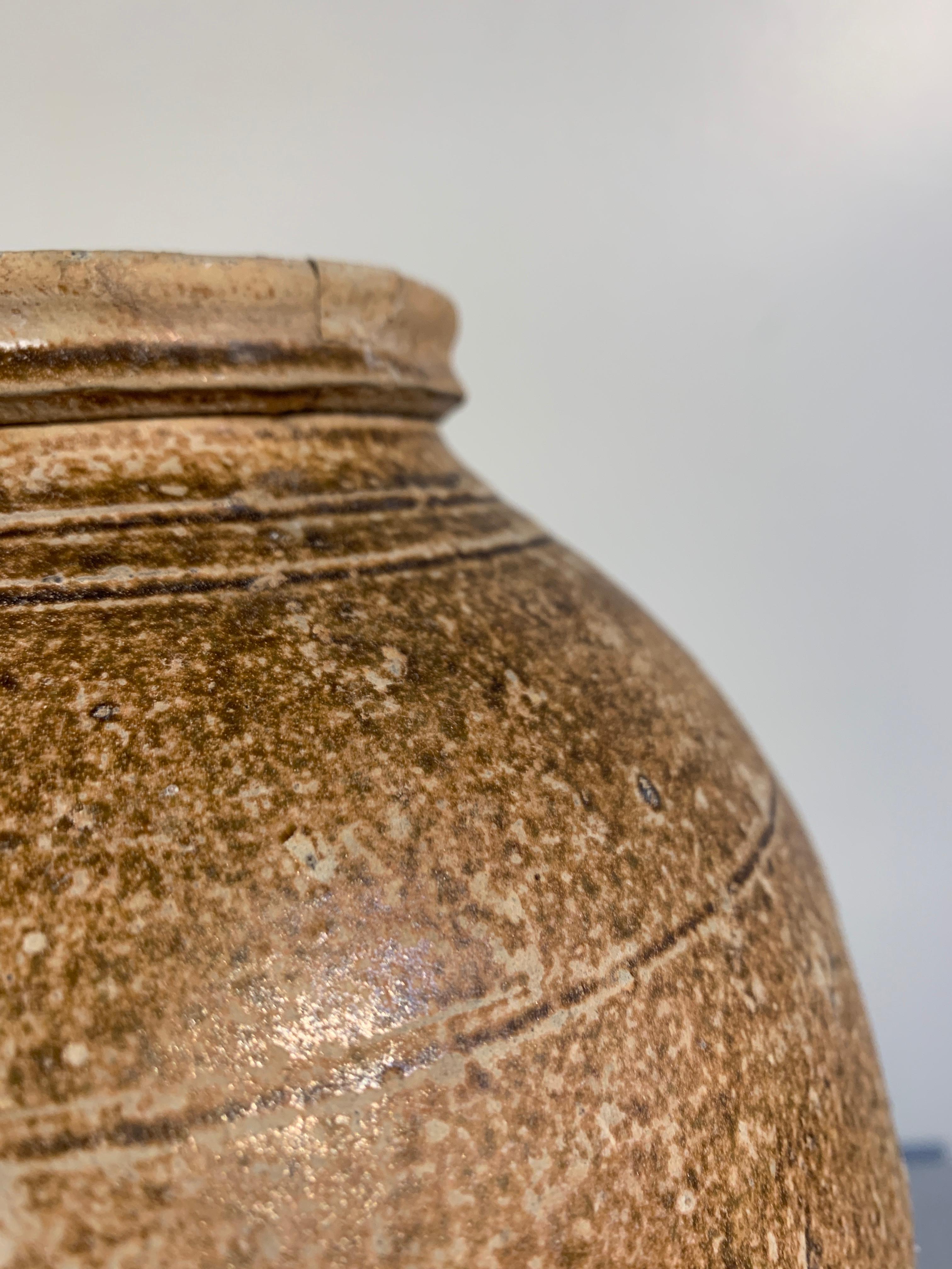 Chinese Tang Dynasty Splash and Drip Glazed Ovoid Jar, circa 8th Century In Fair Condition For Sale In Austin, TX