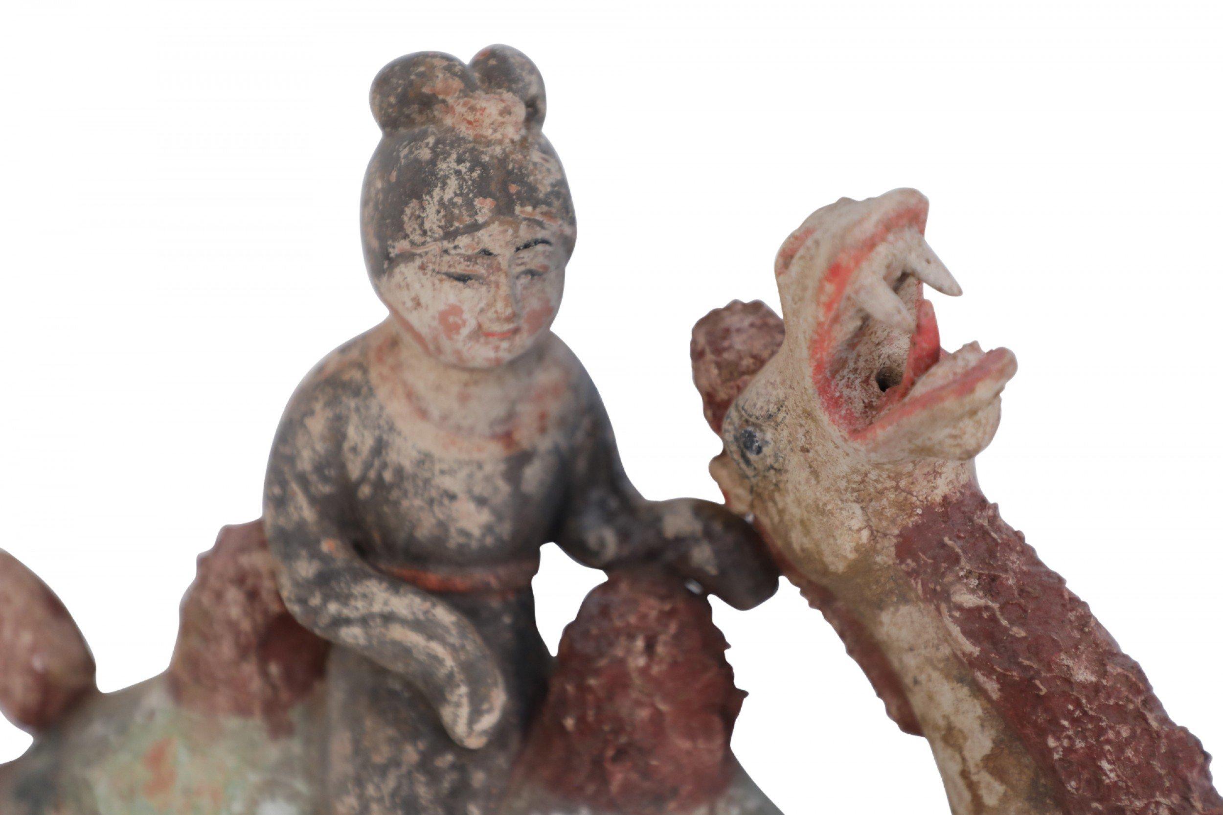 Chinese Tang Dynasty-Style Terra Cotta Woman and Kneeling Camel Tomb Figure For Sale 4