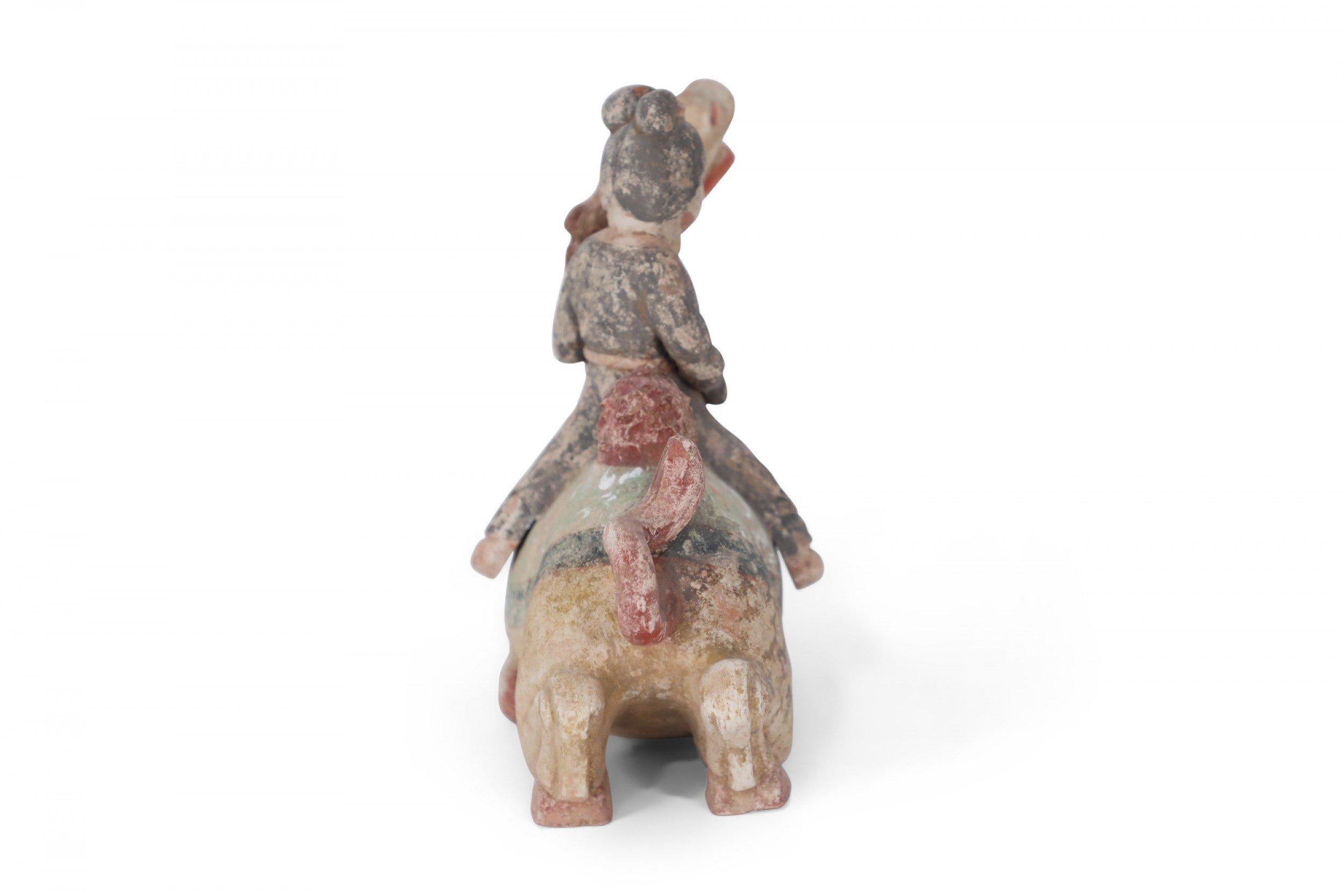 Terracotta Chinese Tang Dynasty-Style Terra Cotta Woman and Kneeling Camel Tomb Figure For Sale