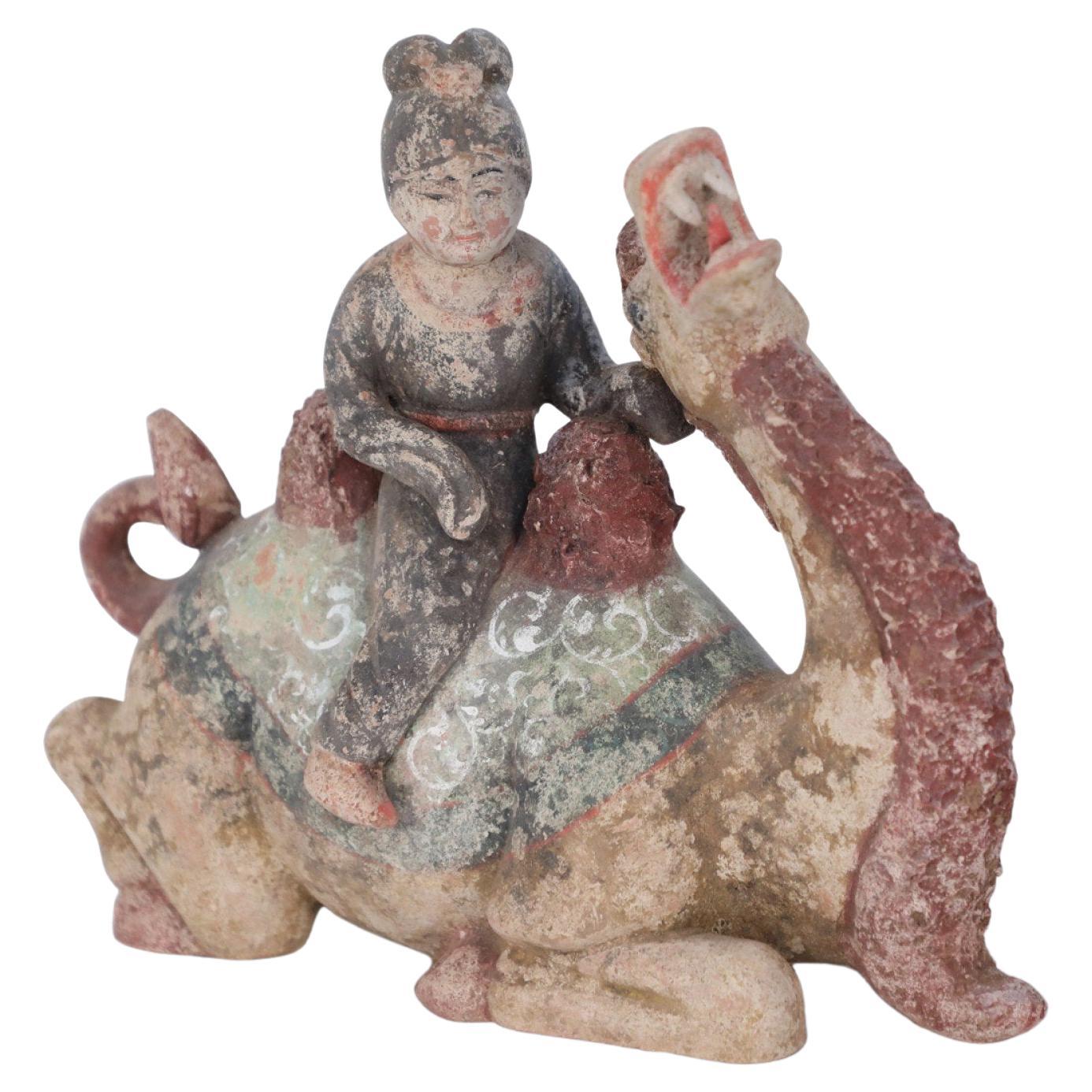 Chinese Tang Dynasty-Style Terra Cotta Woman and Kneeling Camel Tomb Figure For Sale