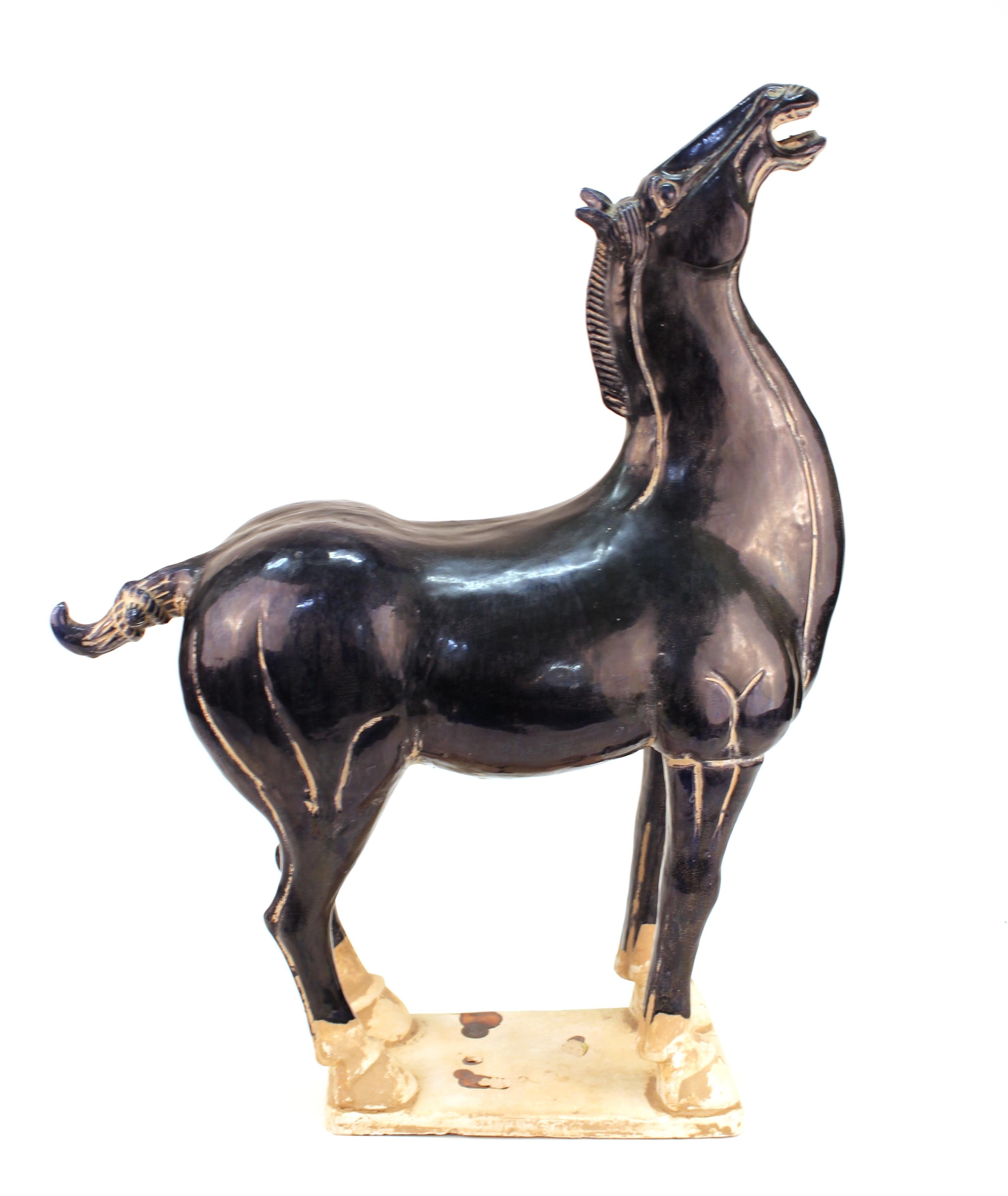 Glazed Chinese Tang Style Terracotta Horse Sculpture in Dark Blue Glaze and Drippings