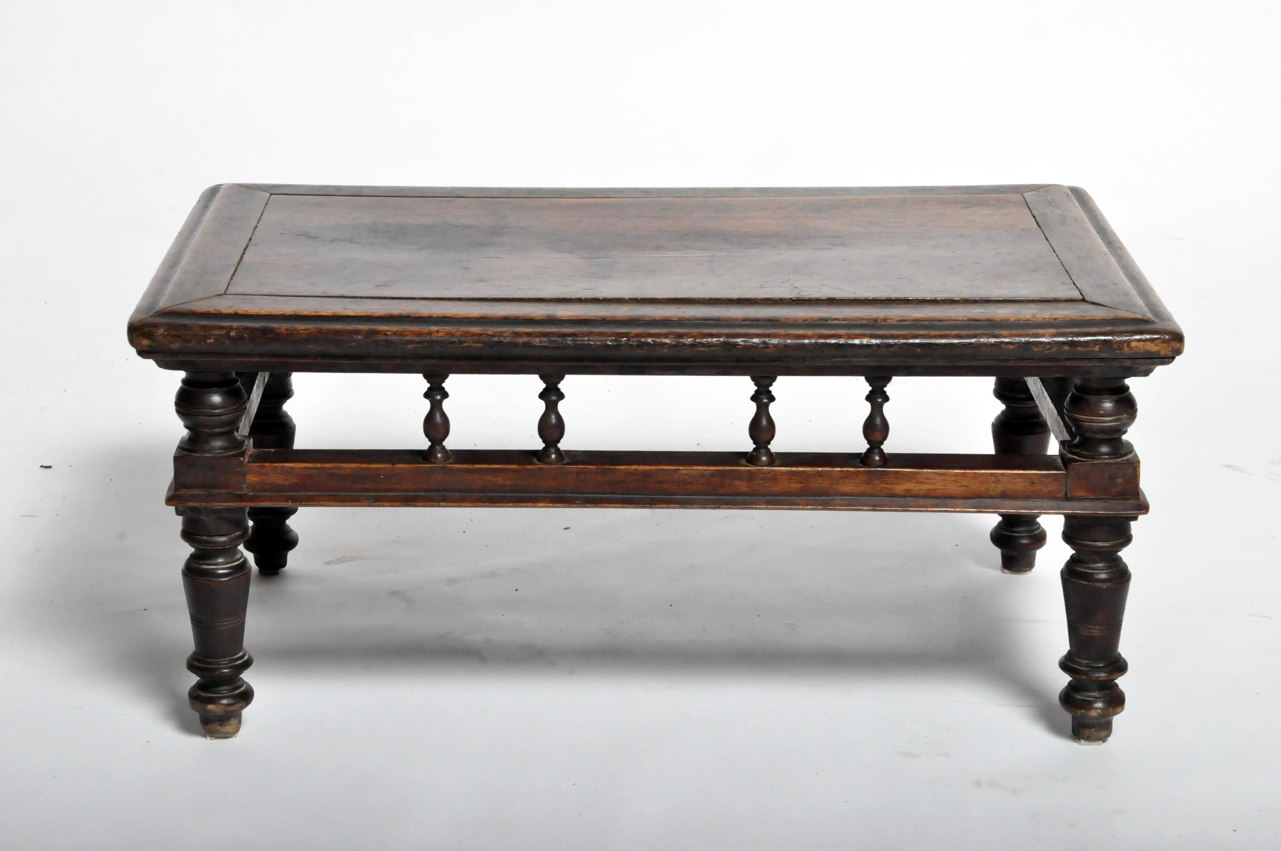 This Chinese tea table is from Shanxi, China, and was made from elmwood, circa 1900. The piece features its original beautifully aged patina. Wear consistent with age and use.
          