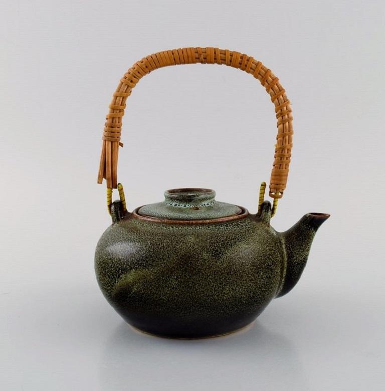 20th Century Chinese Teapot in Glazed Stoneware with Wicker Handle, 20th C For Sale