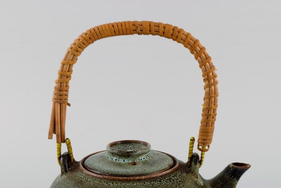 Chinese Teapot in Glazed Stoneware with Wicker Handle, 20th C For Sale 1