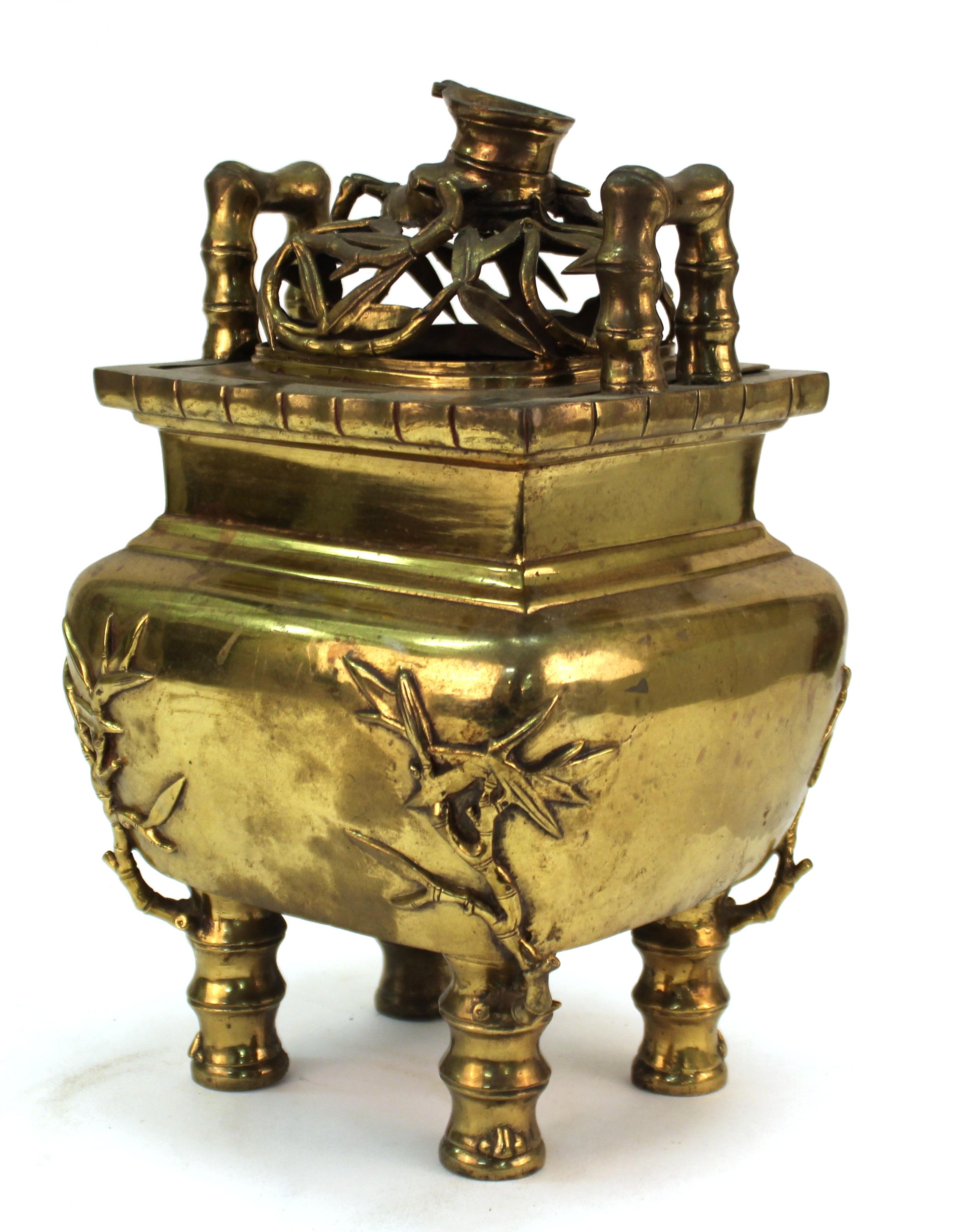 Chinese temple incense burner in gilt brass with a removable top lid and a bamboo motif. The piece has a square section of the lower part missing but remains in good vintage condition with age-appropriate wear to the metal. The original patina has