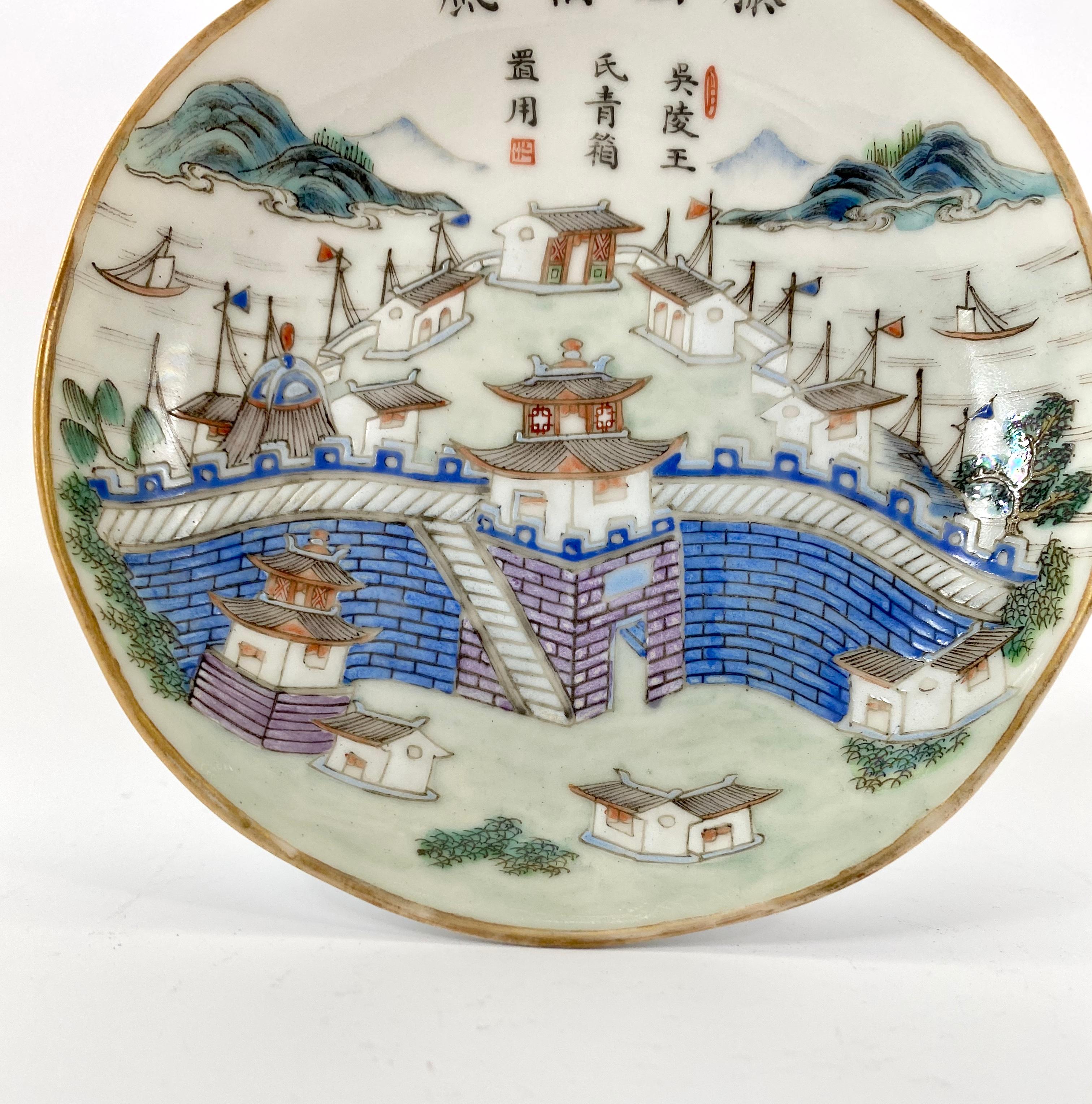 Chinese porcelain dish, Tongzhi mark and period (1862-1874). Well painted in famille rose or fencai enamels, with a titled scene reading 'Teng ge gao feng' that may be translated as 'High Winds at the Pavilion of Prince Teng', circa 1865. The