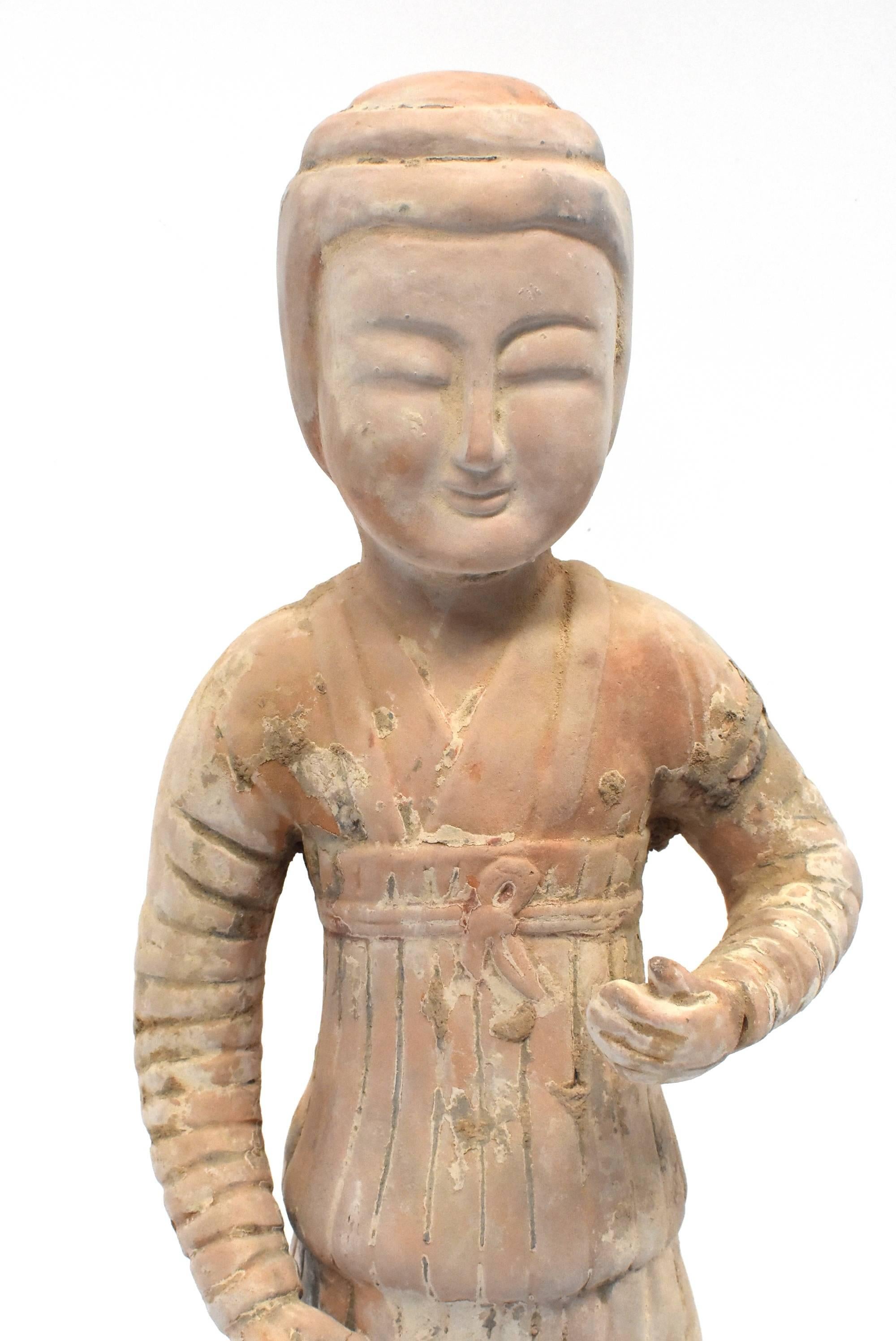 A beautiful terracotta court lady in the Han dynasty style. Featured is a governesses whose job is to train the ladies of the house all manners and etiquette, as well as the maids and servants proper ways of service. She is dressed in traditional