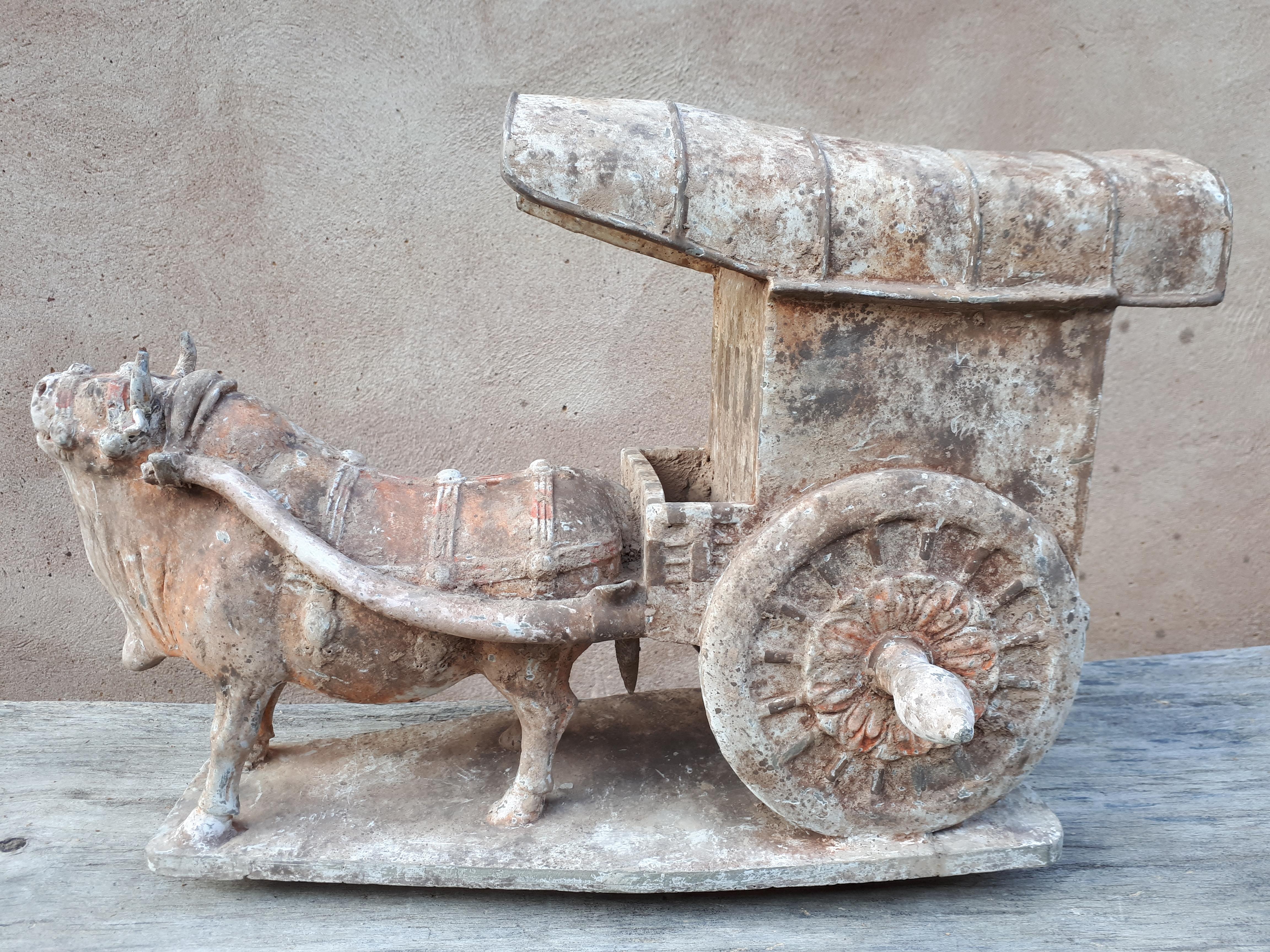 Important and rare polychrome terracotta group representing an ox pulling a cart. Note, invisible professional restoration on the terrace. Otherwise sculpture in very good condition, very attractive (will be sold with its thermoluminescence