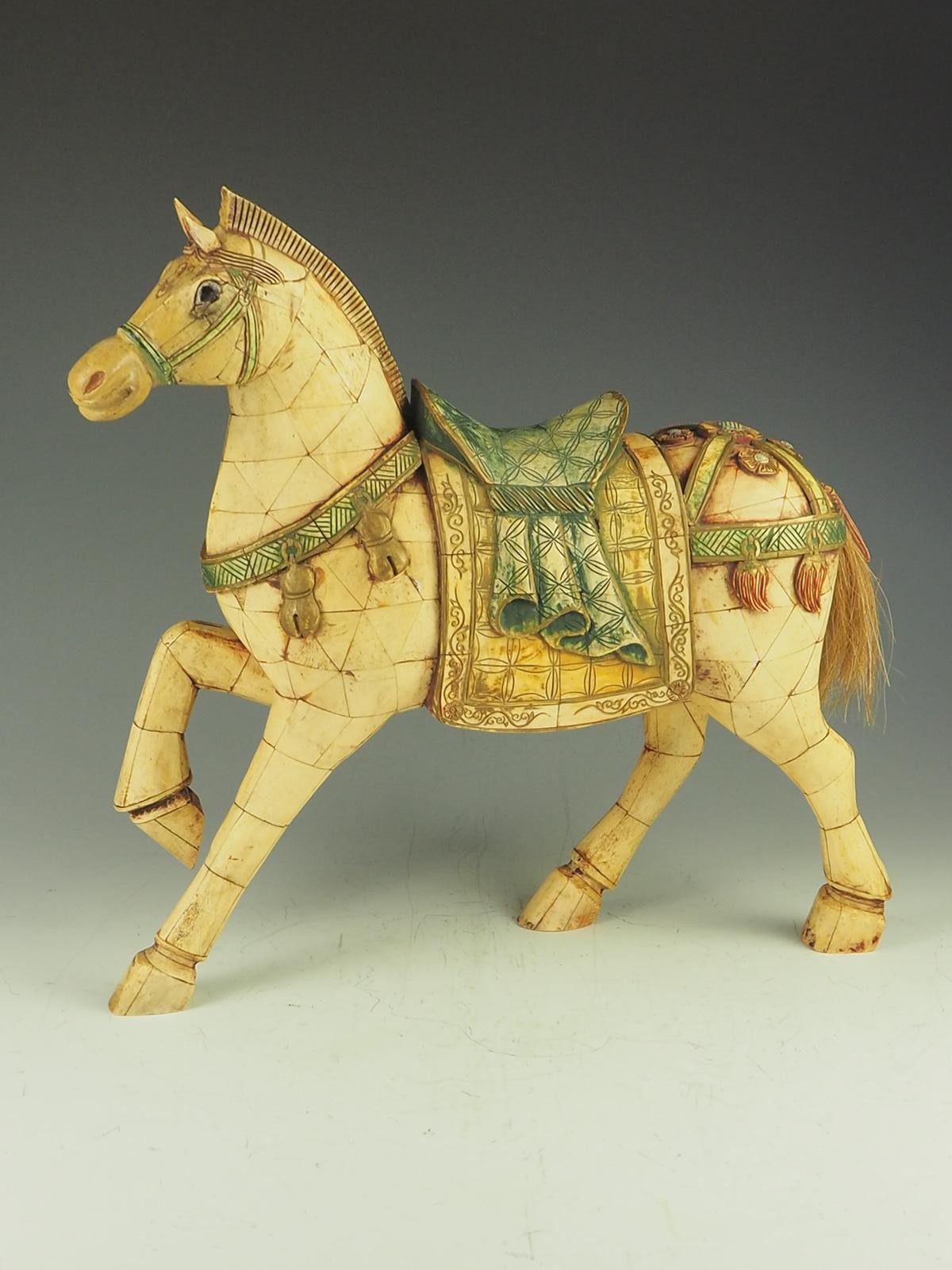 Chinese tessellated bone horse sculpture circa 1950s.

Modeled after an actual horse discovered during the “Tang Dynasty” period, 618-906 A.D.