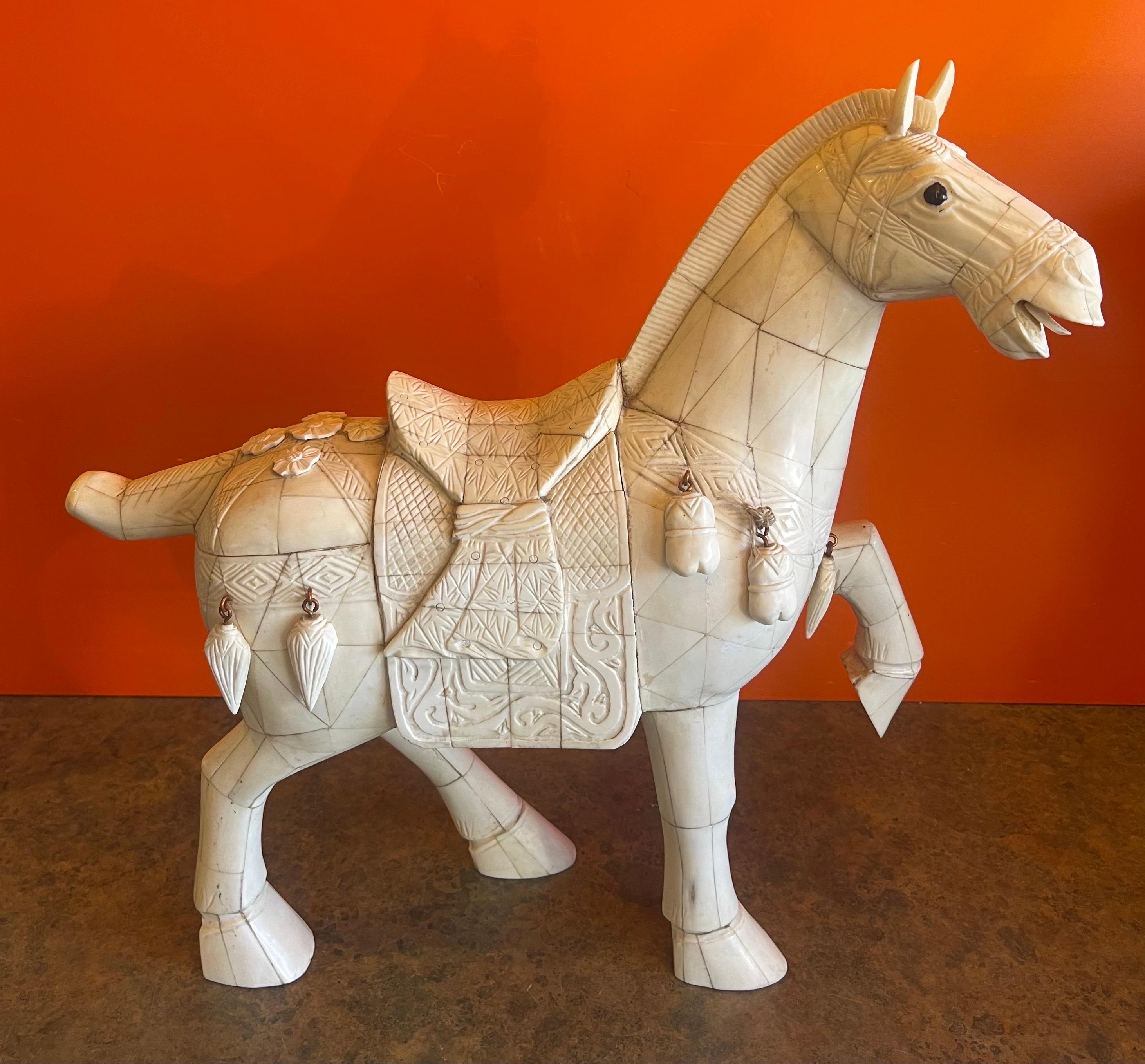 Gorgeous Chinese tessellated bone T’ang horse sculpture circa 1950s. Modeled after an actual horse discovered during the 