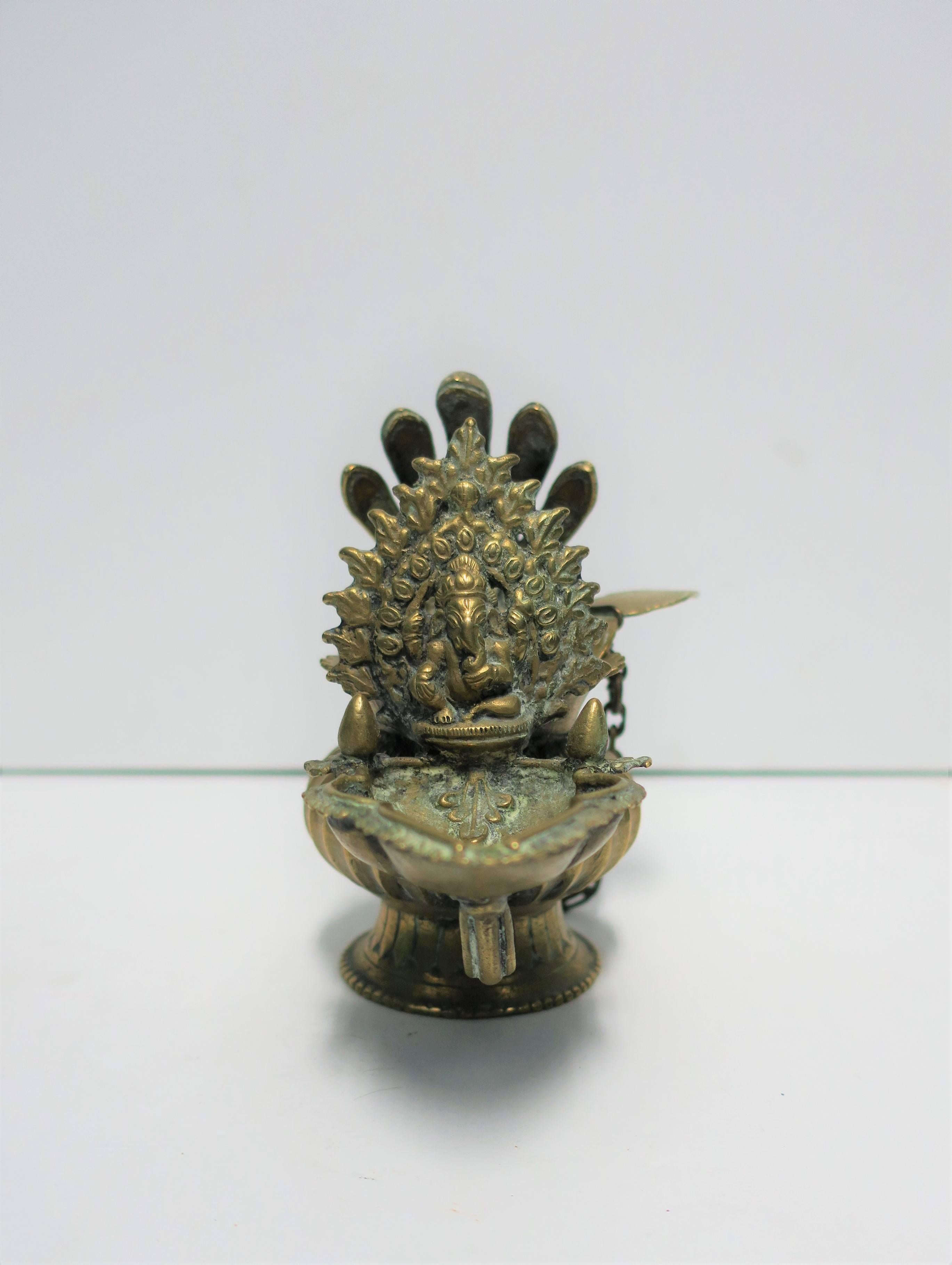 A beautiful and finely crafted solid bronze Nepalese 'Sukunda' ceremonial oil lamp, circa mid-20th century, Nepal. This version or model is a fine example of the original from the 17th Century. Very good condition as shown in images. Dimensions: