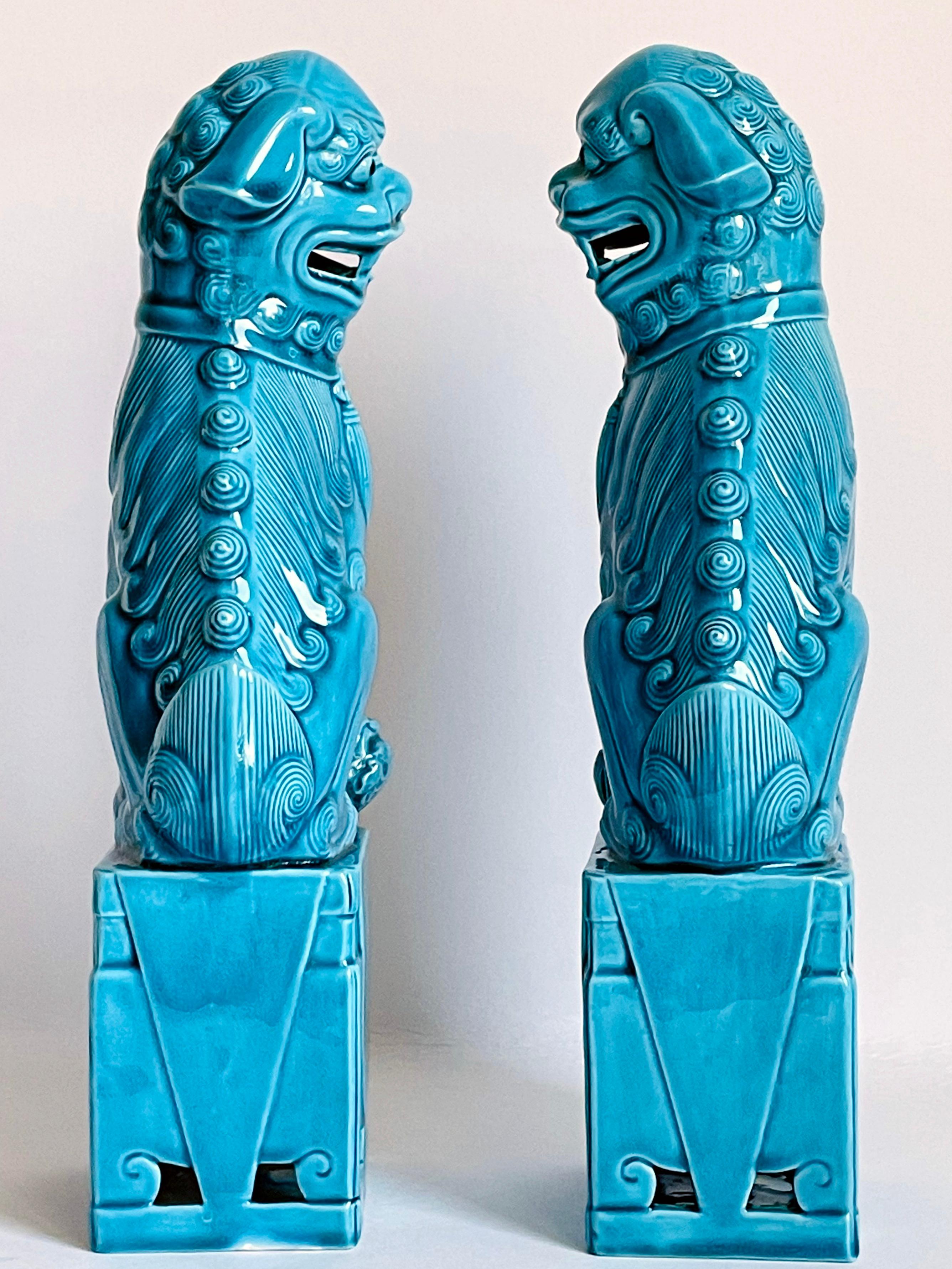 Exportation chinoise Chinois/Lions en porcelaine émaillée turquoise montés sur lion