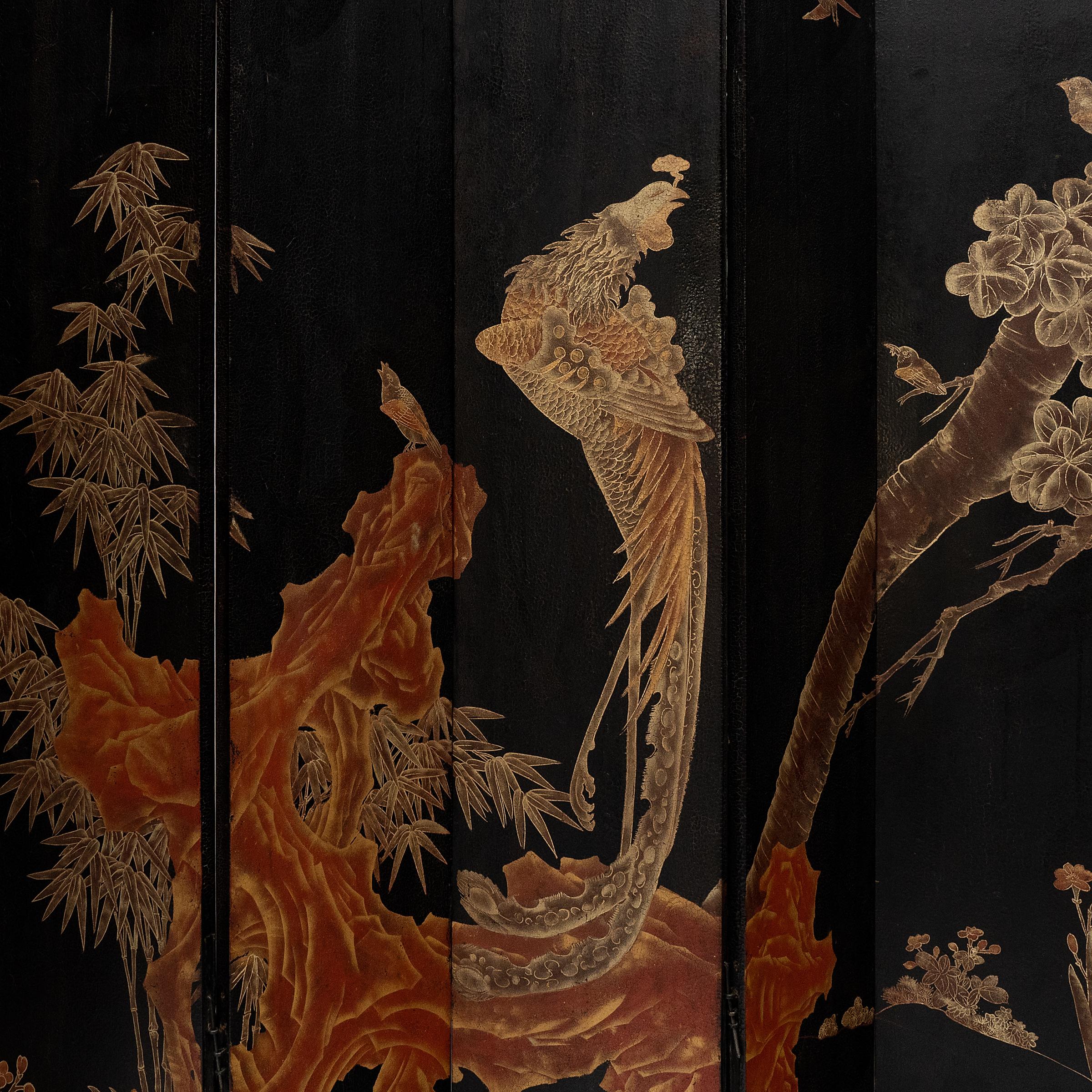 20th Century Chinese Twelve Panel Gilt Lacquer Folding Screen, c. 1920