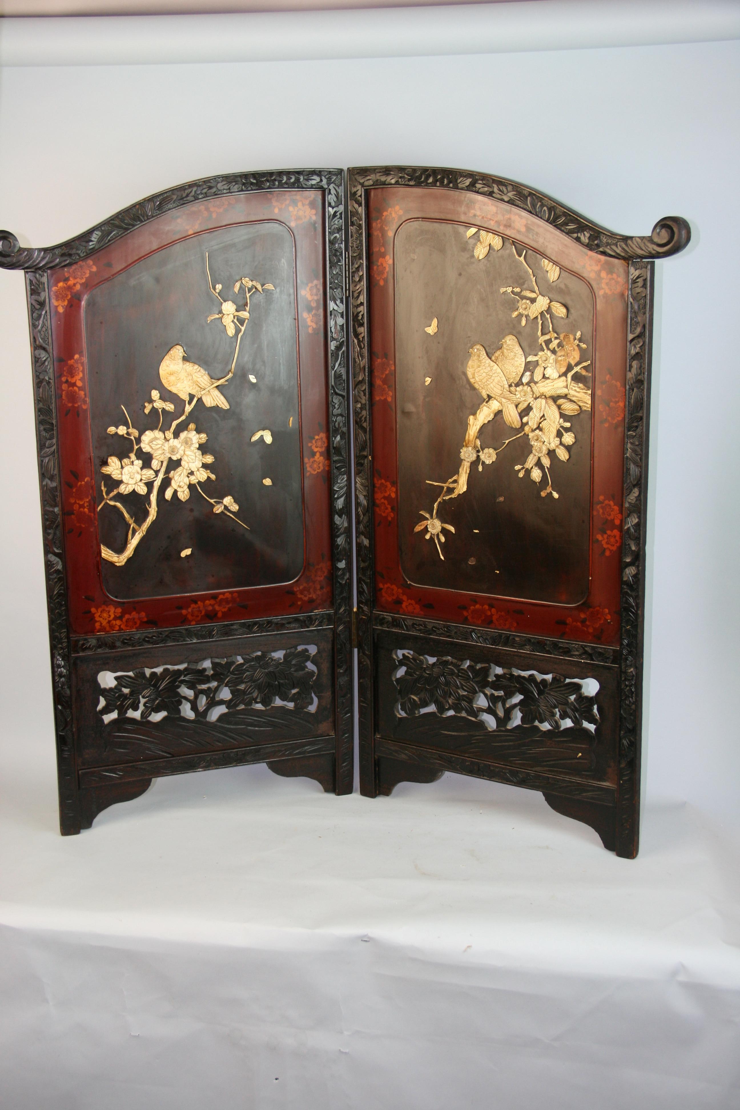 Chinese carved wood and bone 2 panel screen.